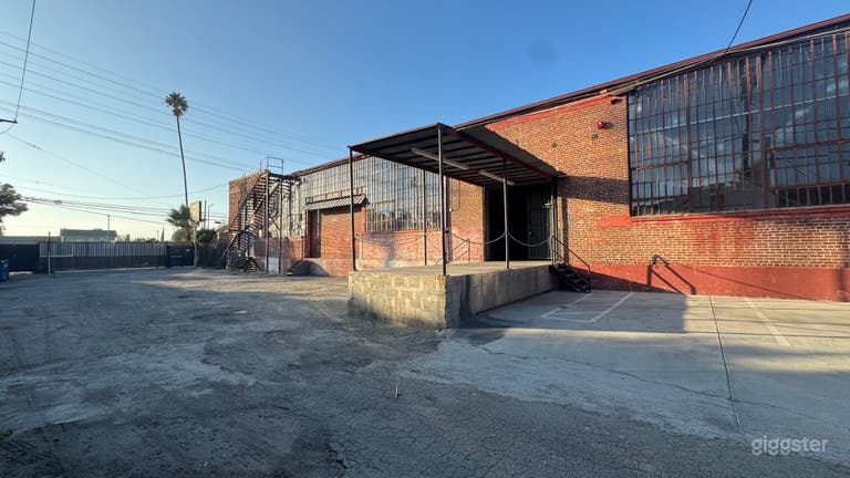  Industrial Red Brick Exterior Gated Parking Lot 