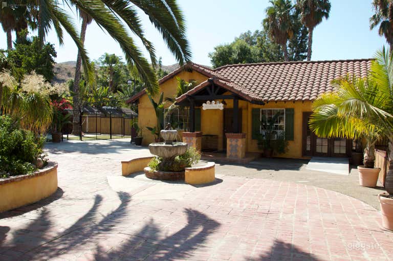  Pet Ranch with several pools and Spanish style 