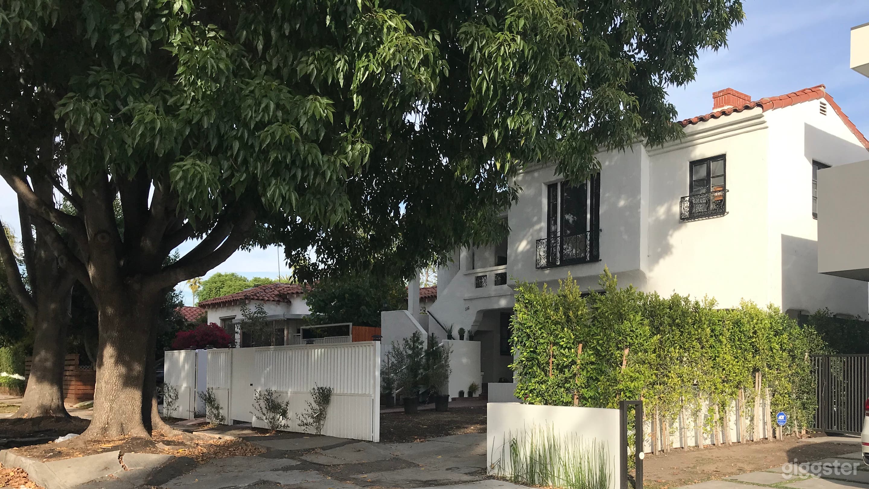 Street view showing amazing tree in front of the property. 