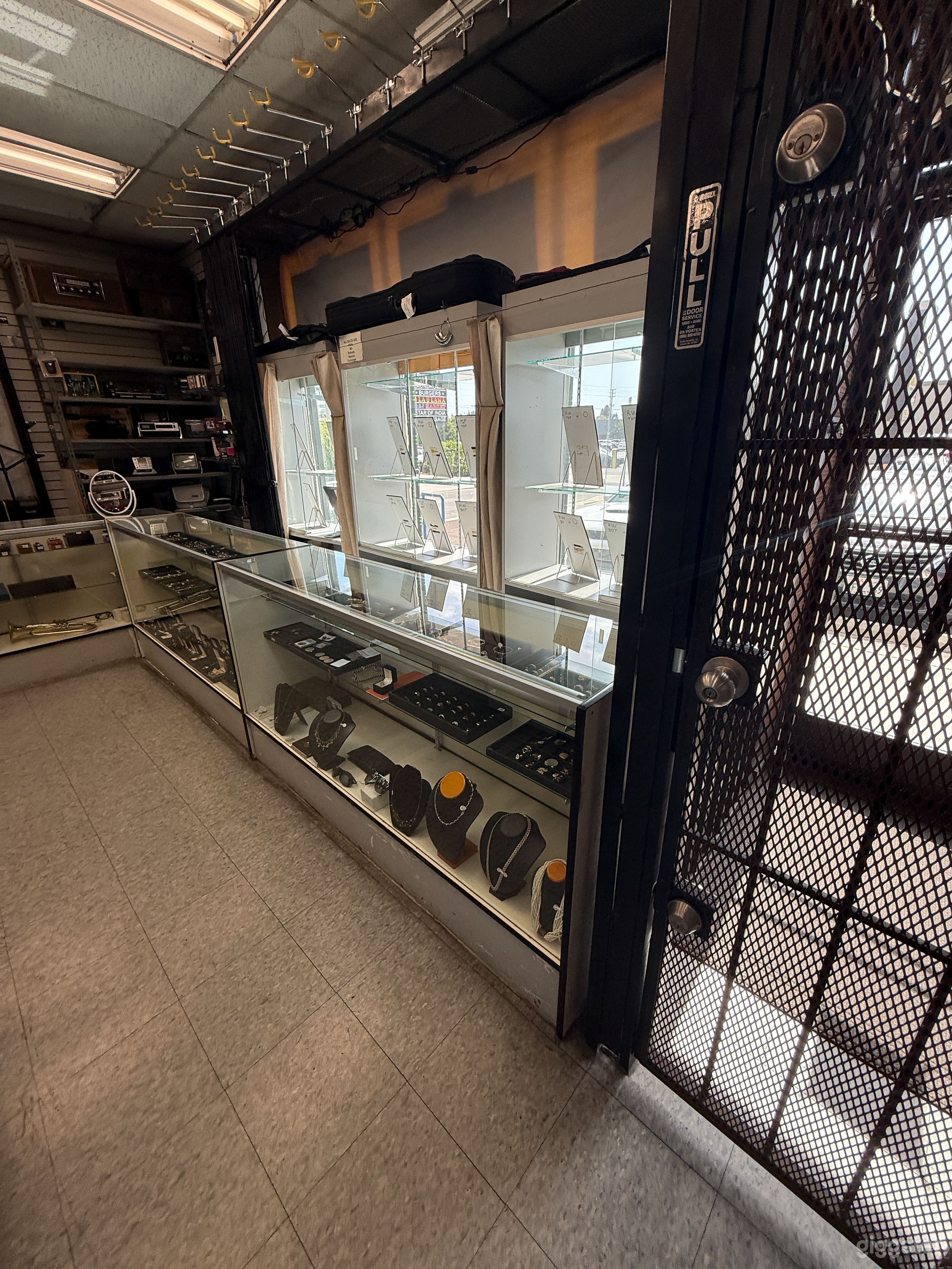 Authentic LA Pawn Shop w/ Retro Signage & Transaction Window Photo 3