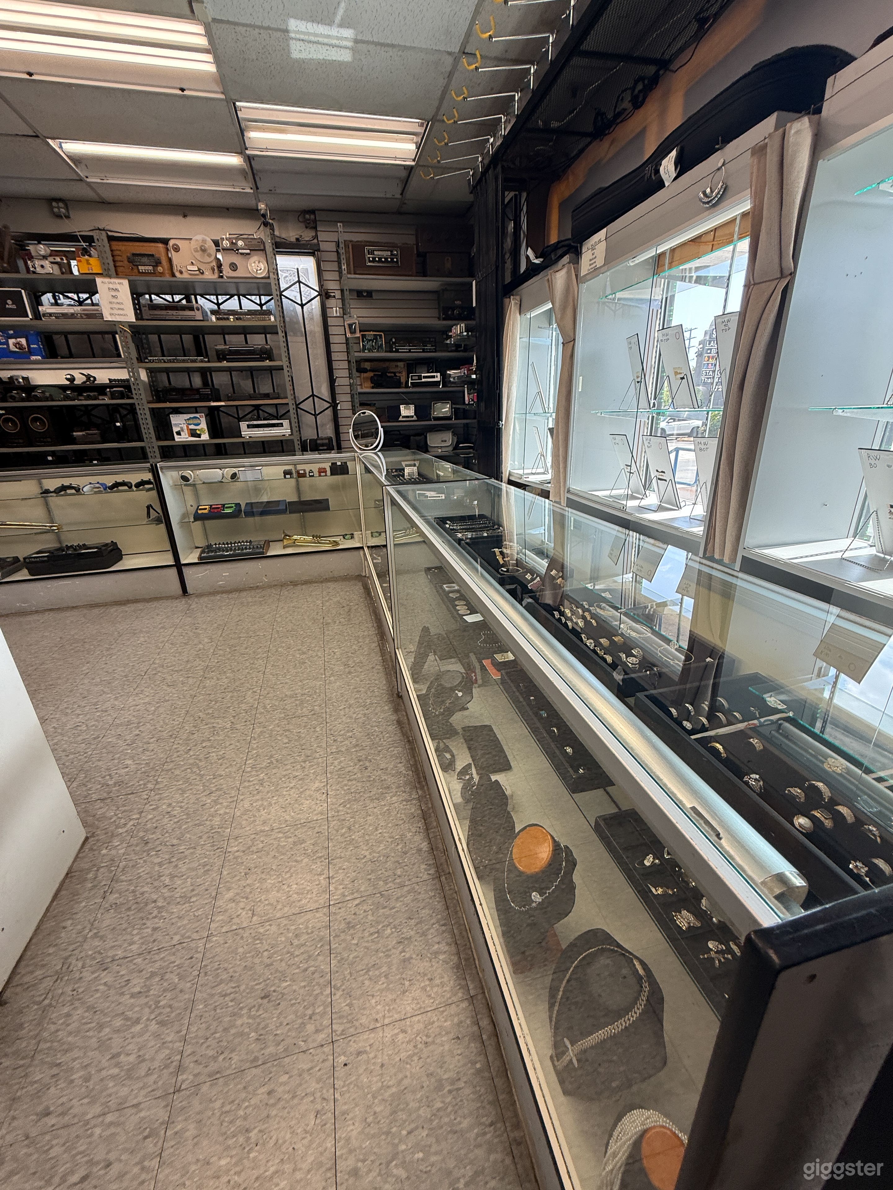 Authentic LA Pawn Shop w/ Retro Signage & Transaction Window Photo 1