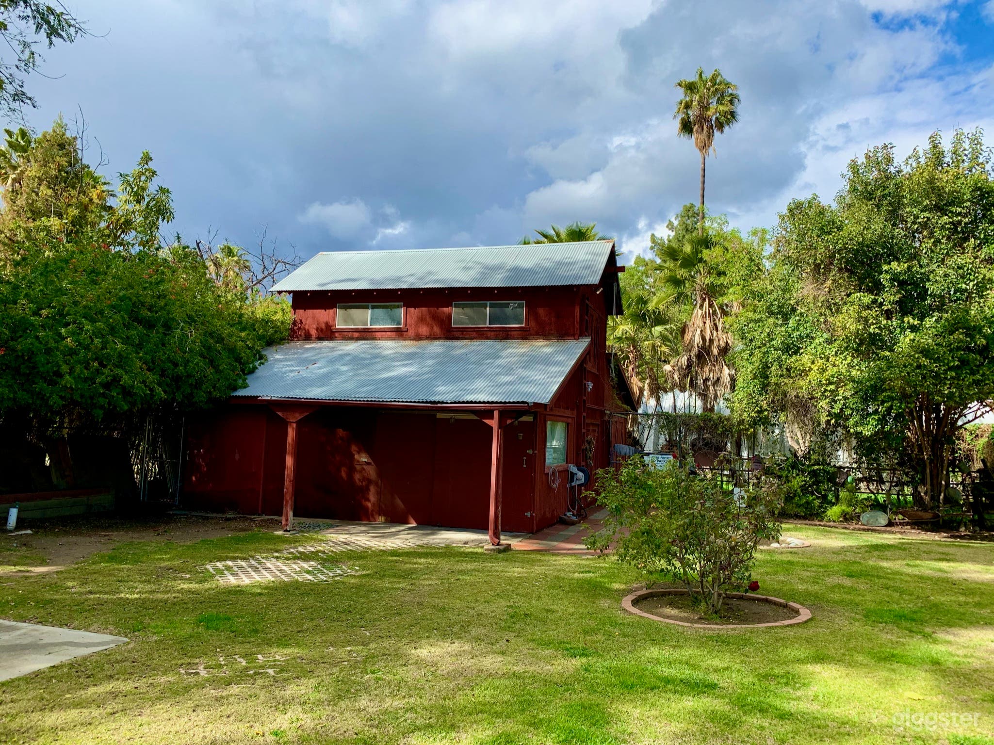 Original structure with corrugated roofs.
Hayloft, main entrance with double doors.