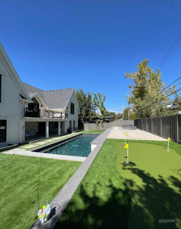 Flexible Backyard rental with Pool and Green Turf Photo 3