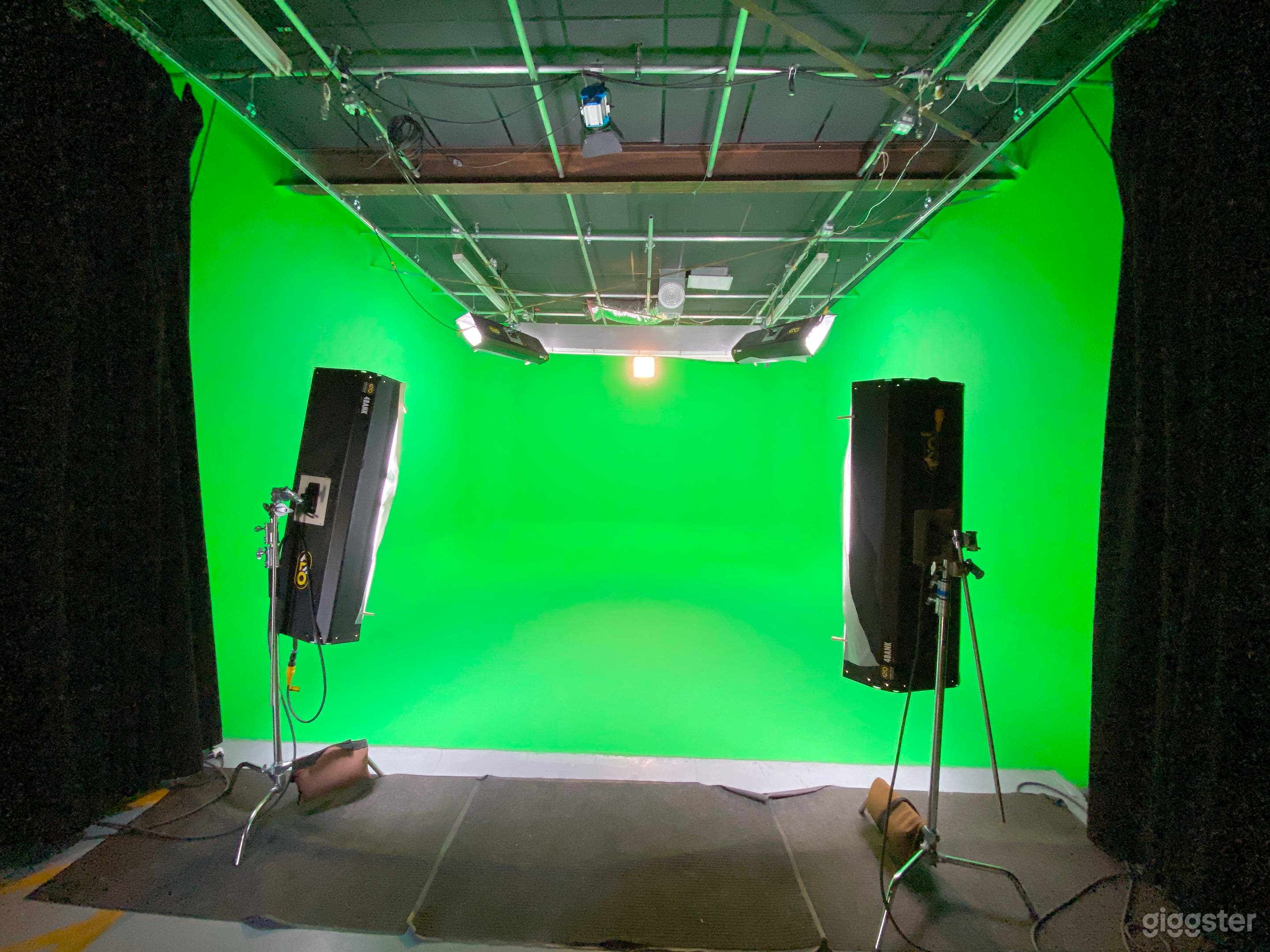 Wide shot of Pre-lit green screen sound proof studio