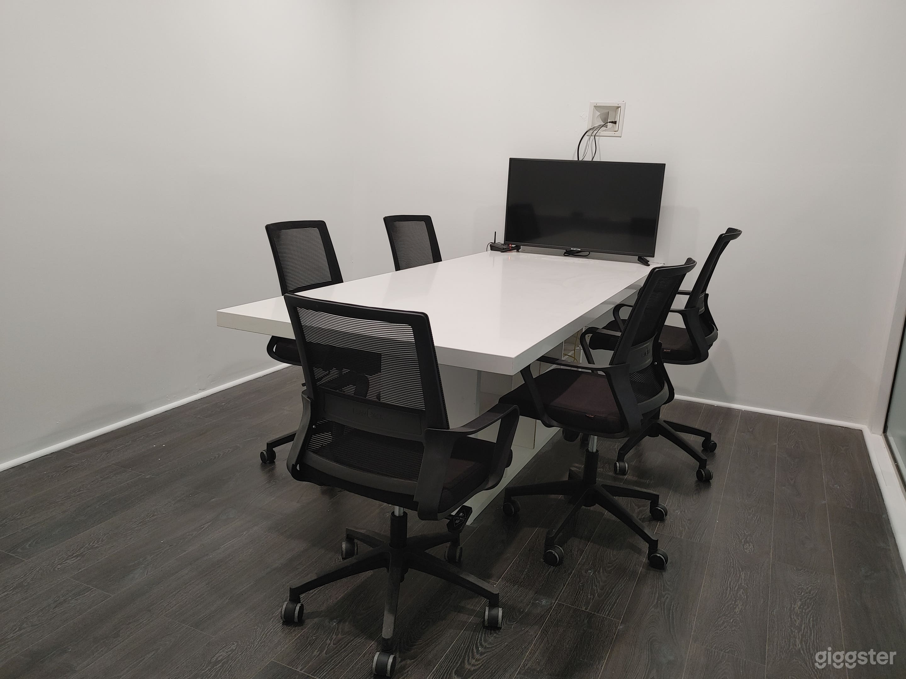 7 Person Conference Room with 40" Color Monitor, White Board and Color Printer with WIFI!