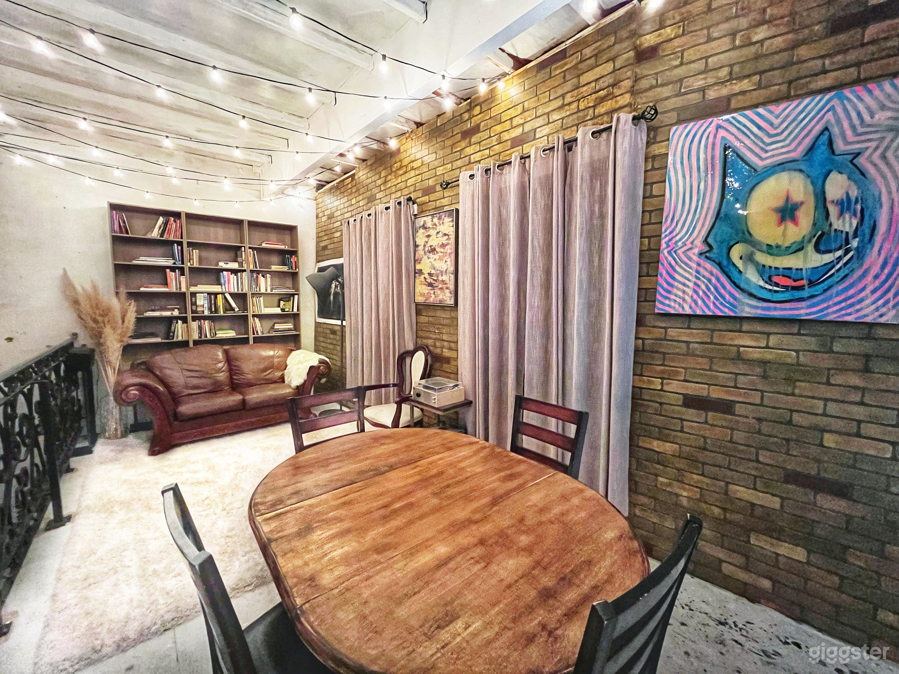 Our loft not only provides an elevated vantage point to capture action happening below on stage, but it also serves as a versatile Apartment/Study.