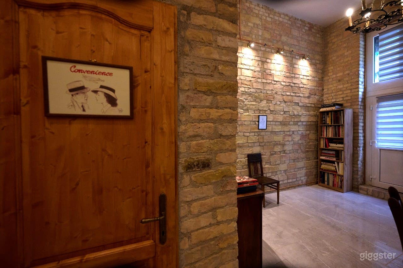 High-Ceiling Brick Gallery | Boutique Bohemian Interior Photo 2