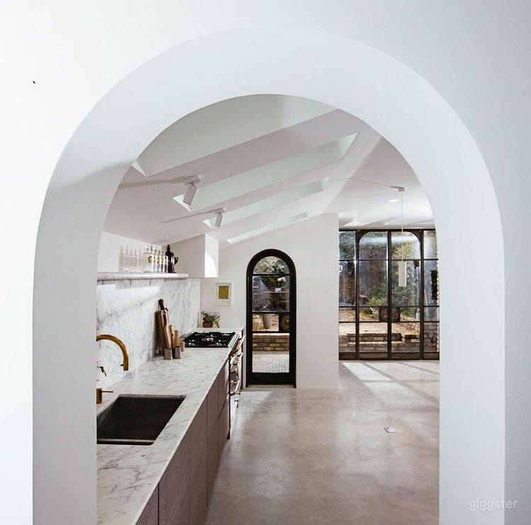 Victorian house / marble concrete Kitchen + Enchanting Courtyard Photo 1