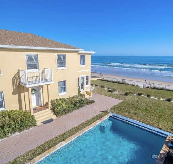 Relaxing Outdoor Pool and Garden at Ormond Beach Photo 4