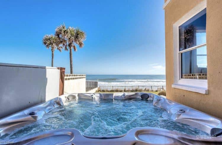 Relaxing Outdoor Pool and Garden at Ormond Beach Photo 2