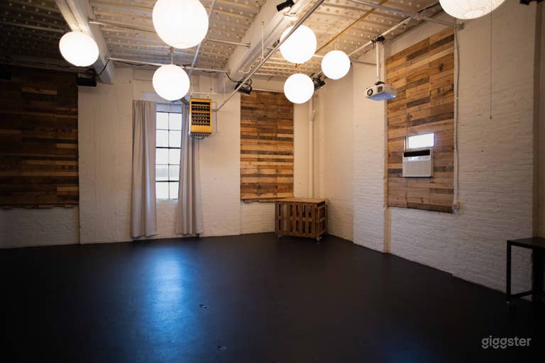  Main Studio: White walls and wood panel walls 