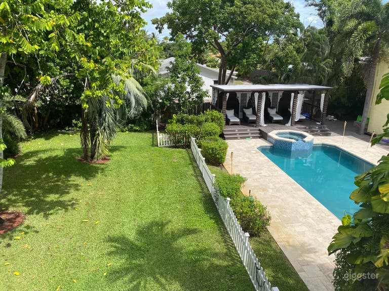  View from the private terrace upstairs over the pool and zen garden. Pool can accommodate 30+ people comfortably seated around it. It also has an outside gas fire table and fire pit in the back 