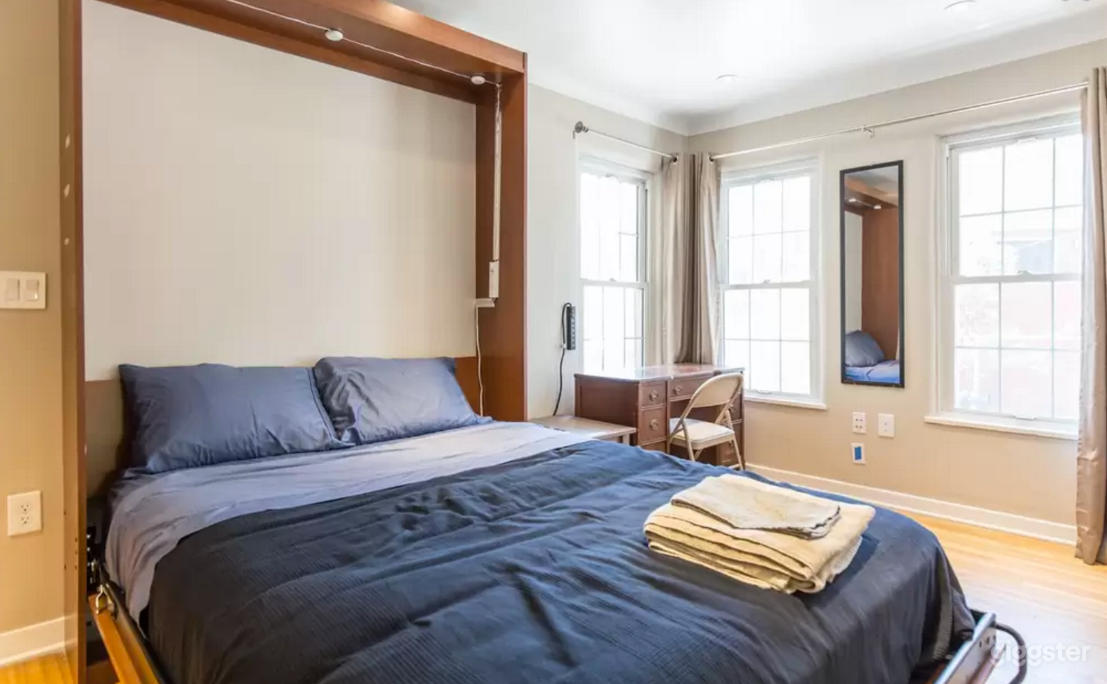 Queen Size Bed.  Can Fold up (Murphy Bed) for increased production room.  Work Desk with beautiful sunlit views.