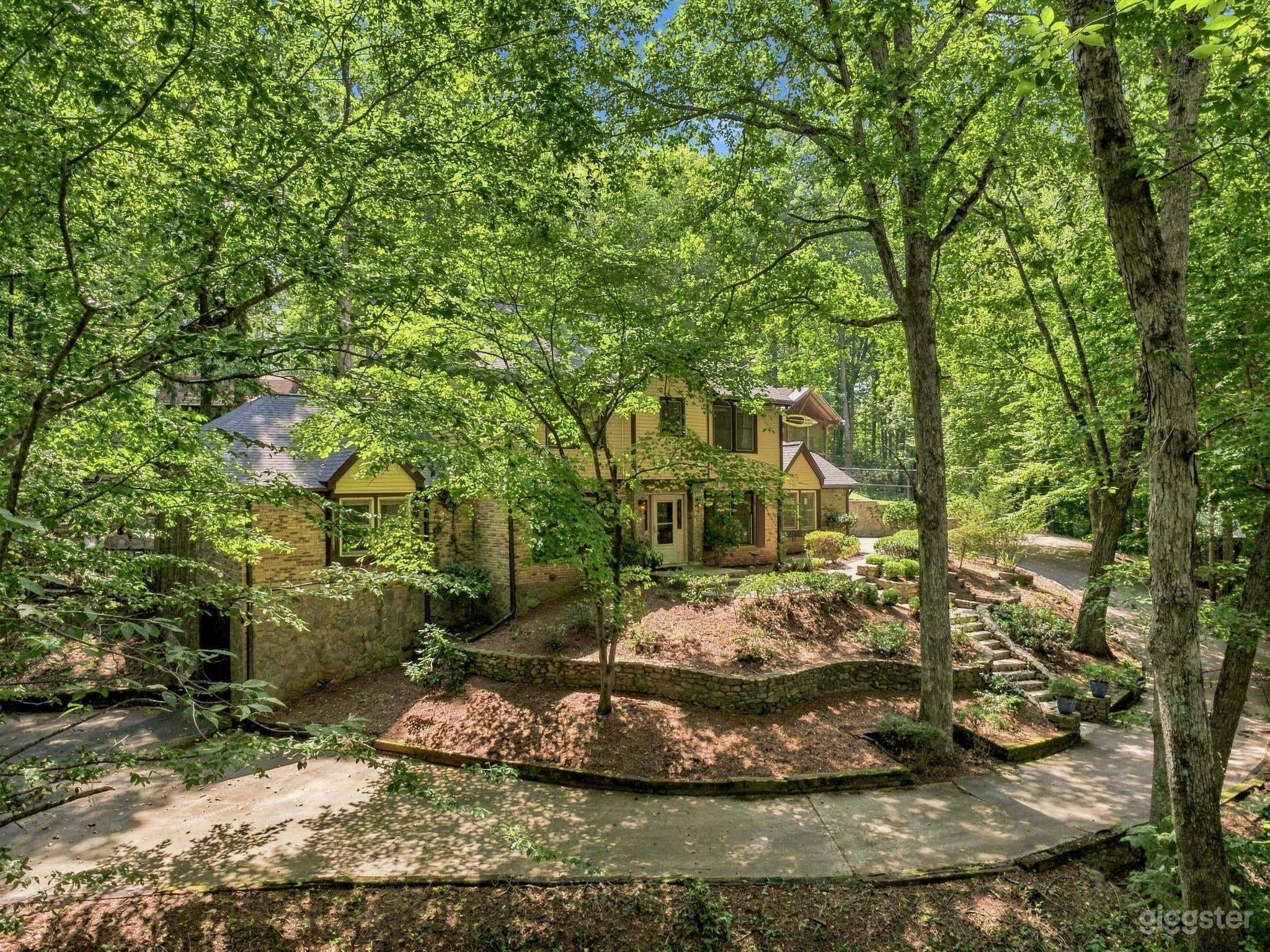Wooded Estate with Red Barn, Pool, Creek & Acreage Photo 4