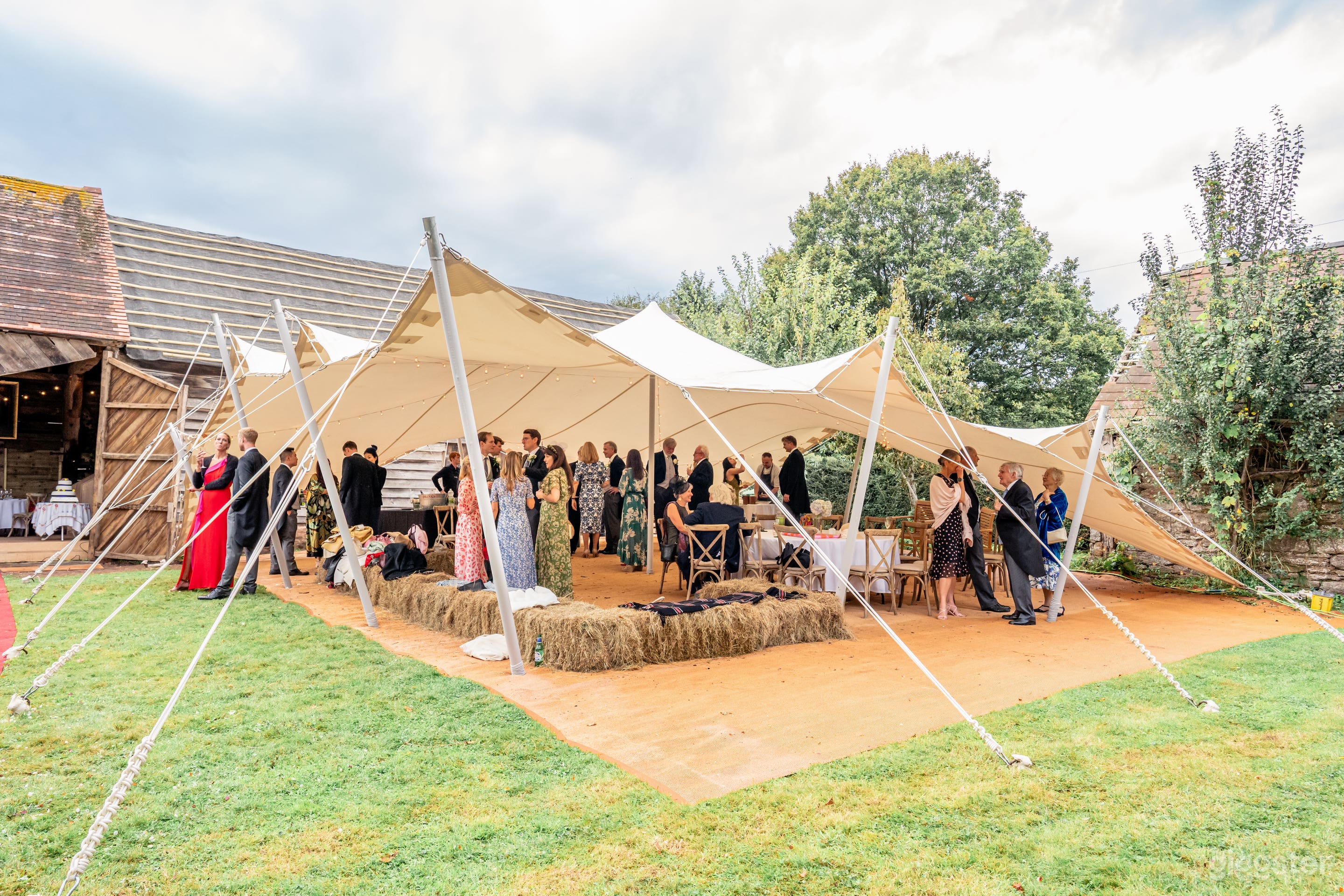 The outside of the barn prepared for hosting a wedding, September 2024