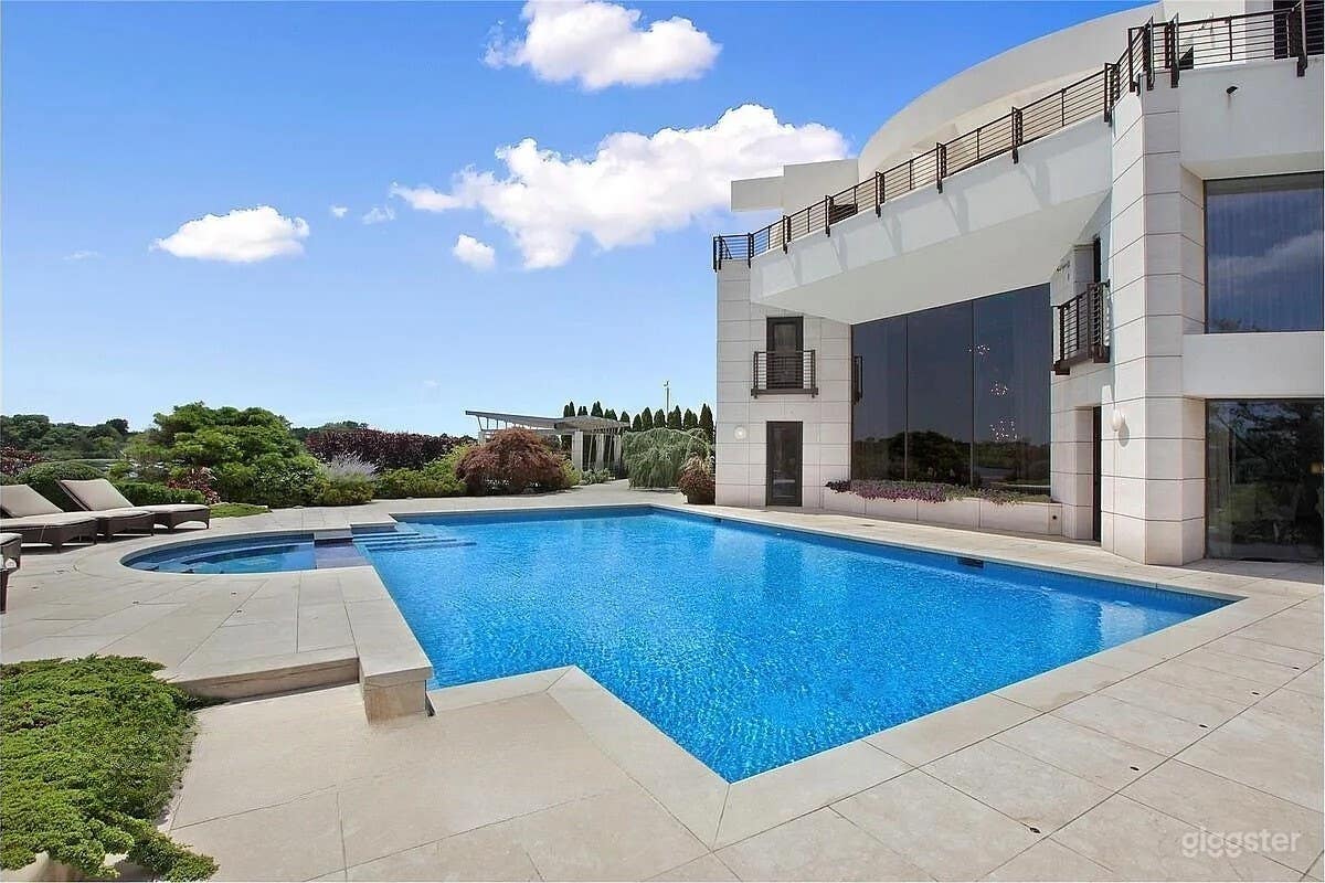 Serene Waterfront Pool Retreat with Spa Photo 4