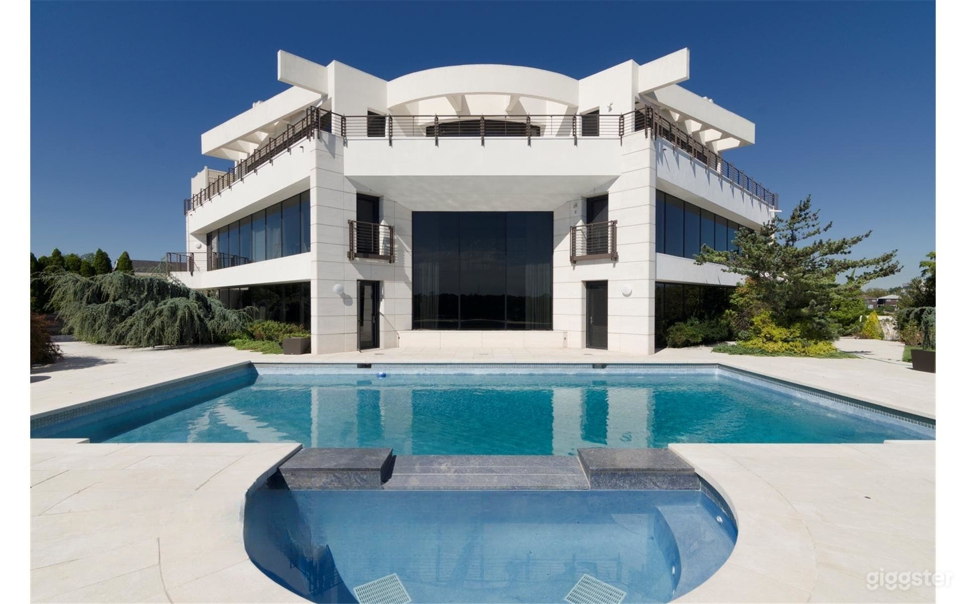 Serene Waterfront Pool Retreat with Spa Photo 3