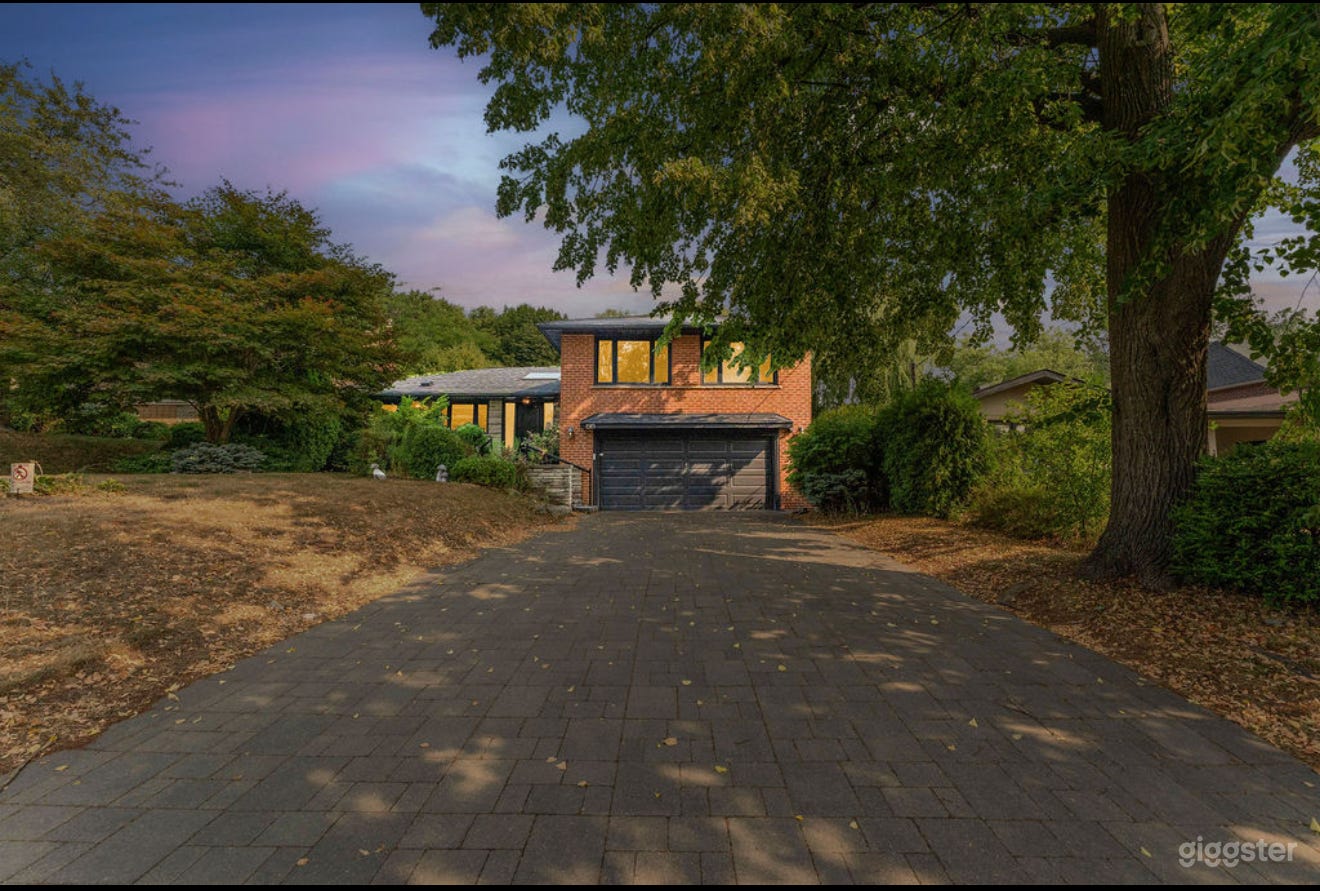 Modern Home with Forest Like Backyard Photo 1