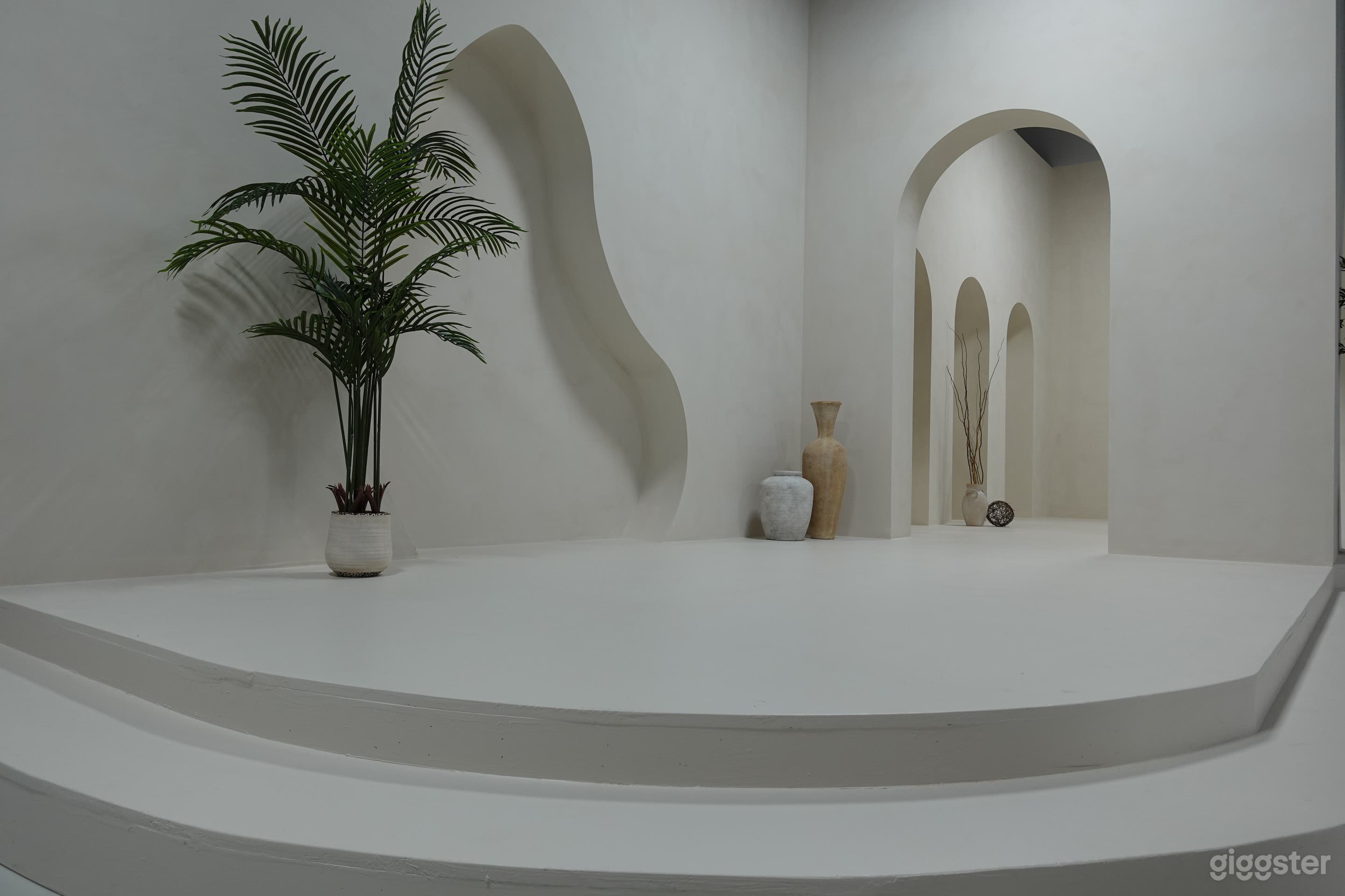 The arch walkway that divides the 2 stage sets can be seen here. This arch is taller than the other arches to provide a comfortable amount of room to walk in and out from.