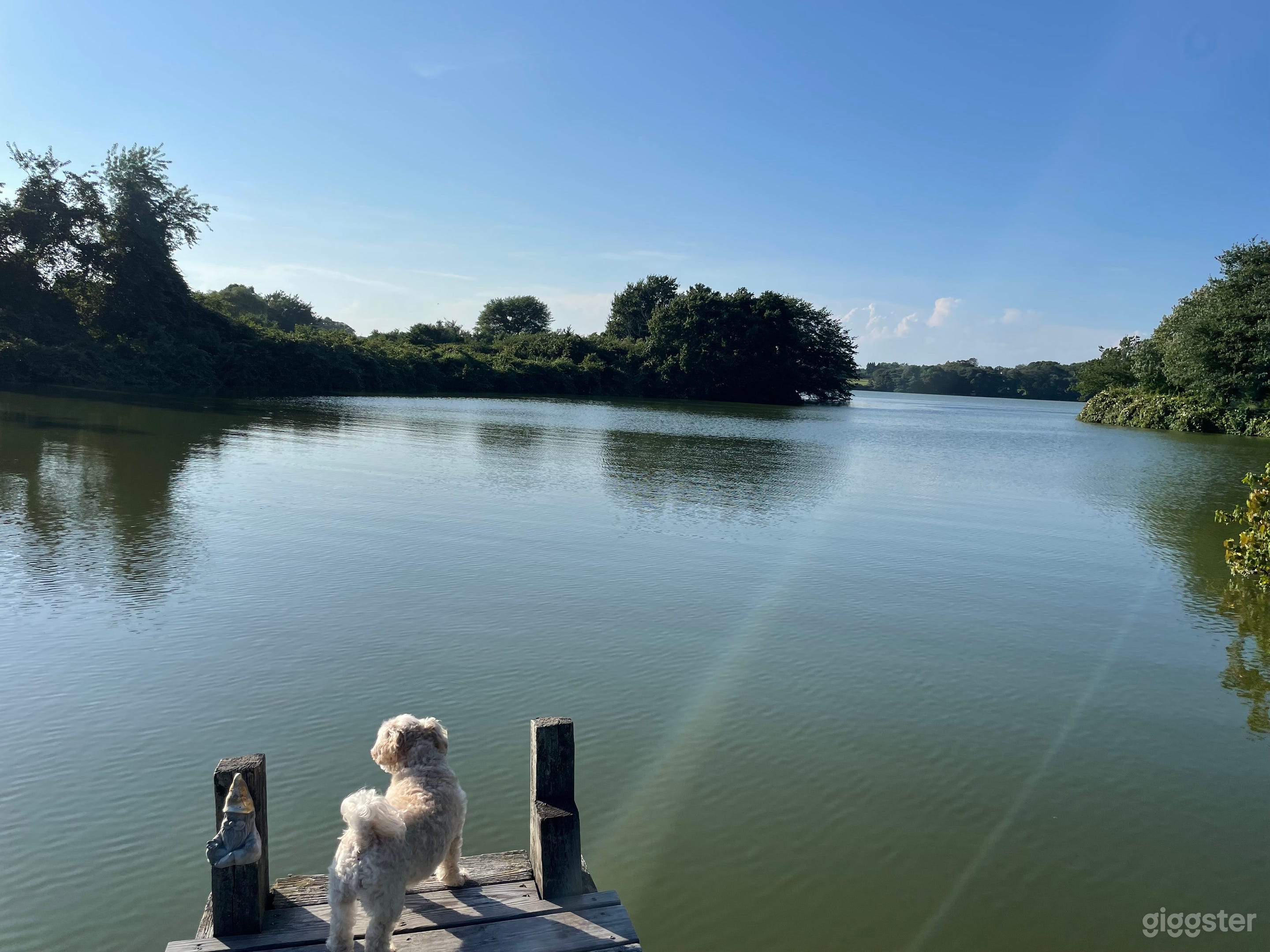 This idyllic home sits on a beautiful pond with private dock. Kayaks and paddle boards available.