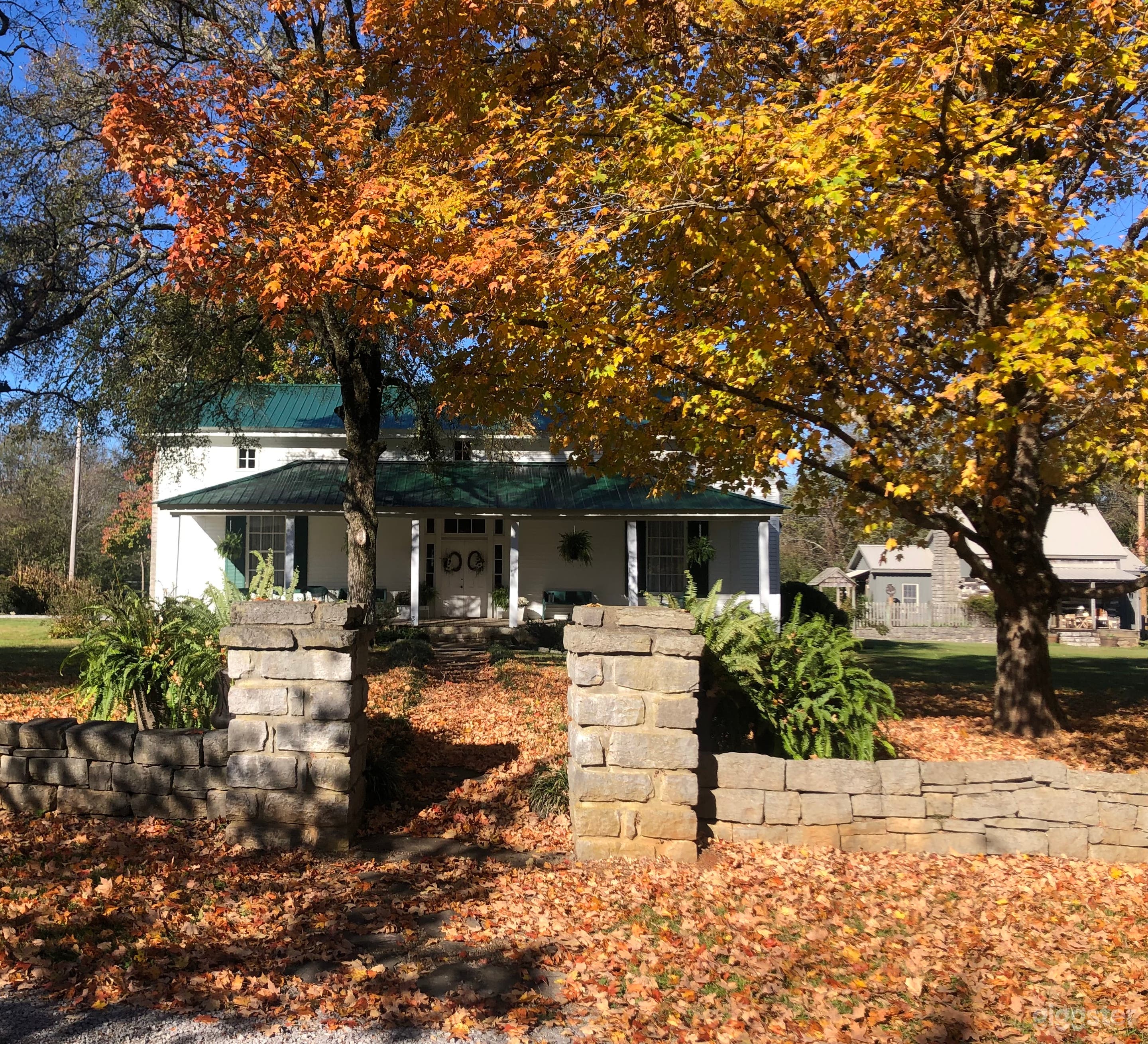 Farmhouse and cabin in fall