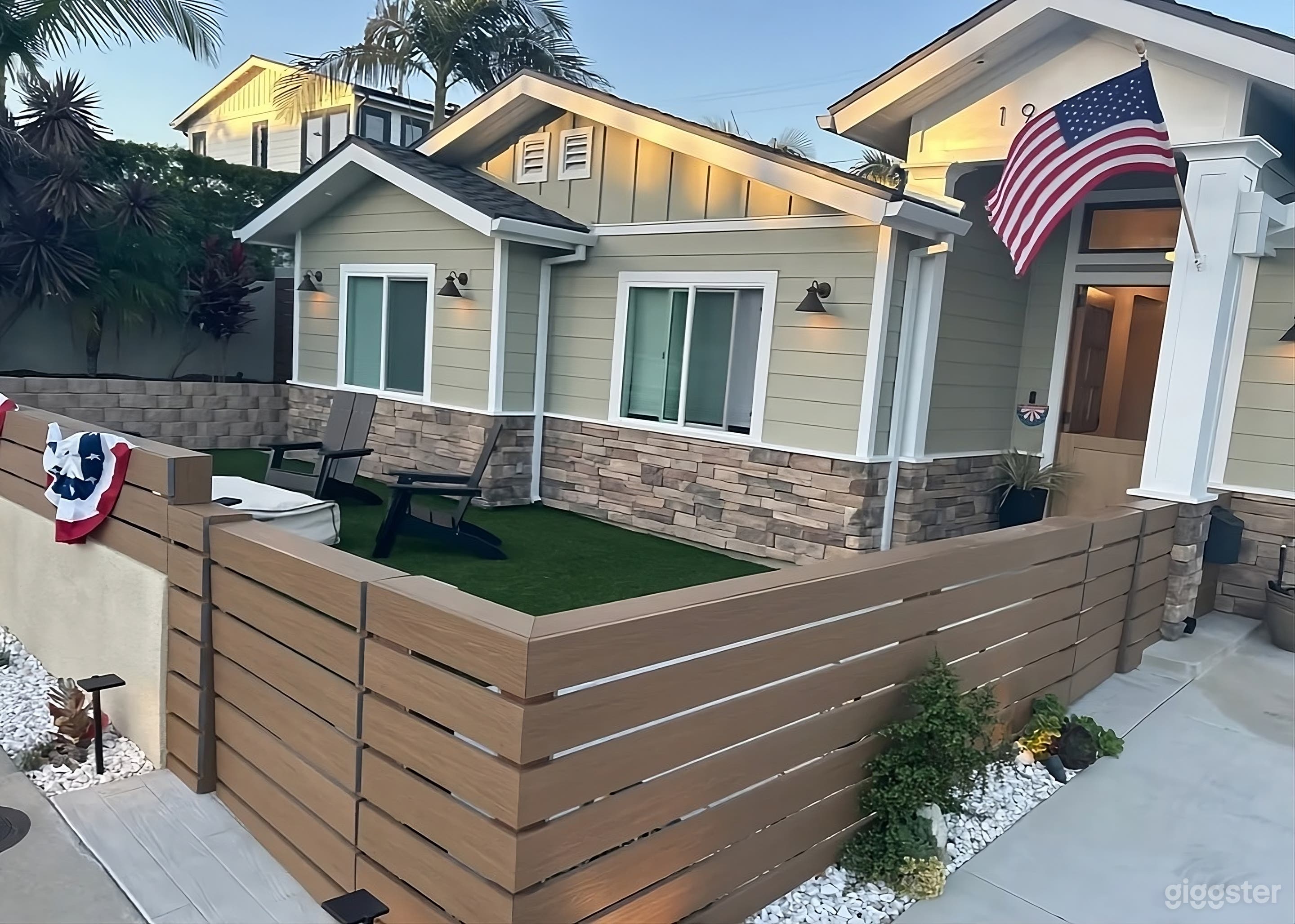 Backyard with Covered Patio and Fireplace Photo 4