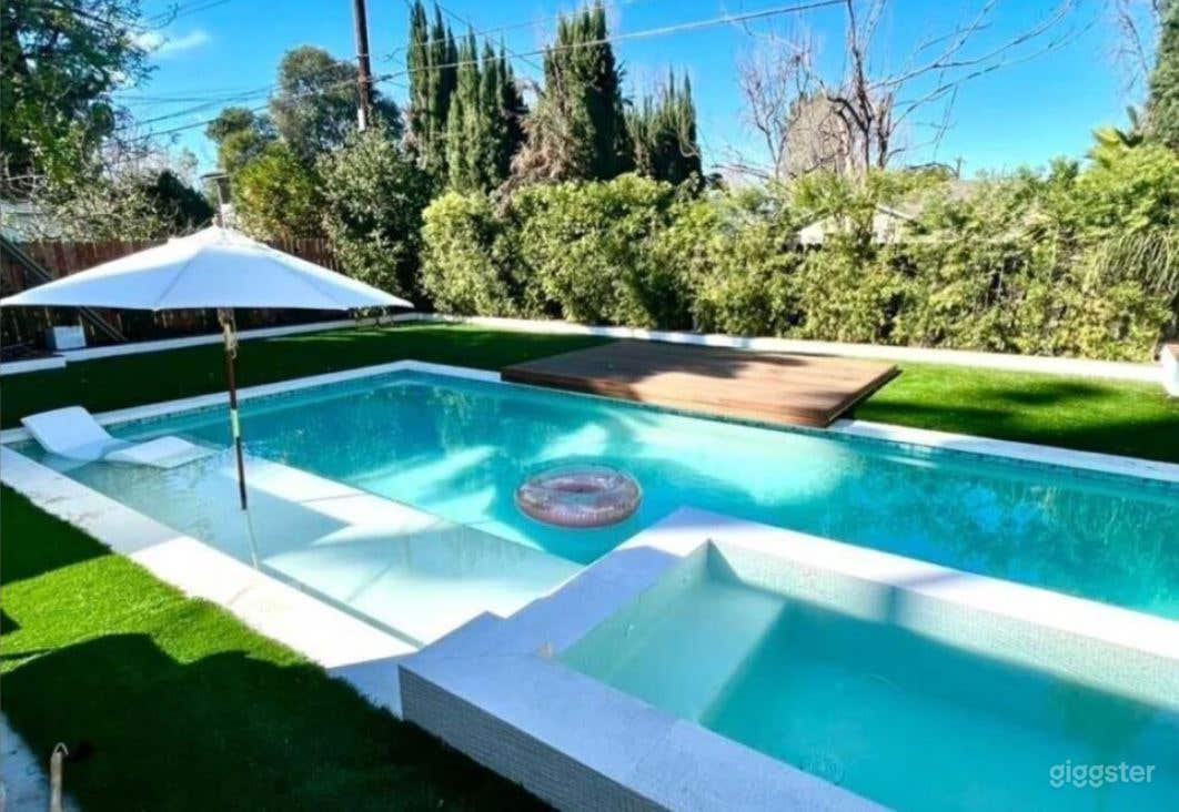 Fabulous Pool Backyard with Jacuzzi and Bar Photo 1