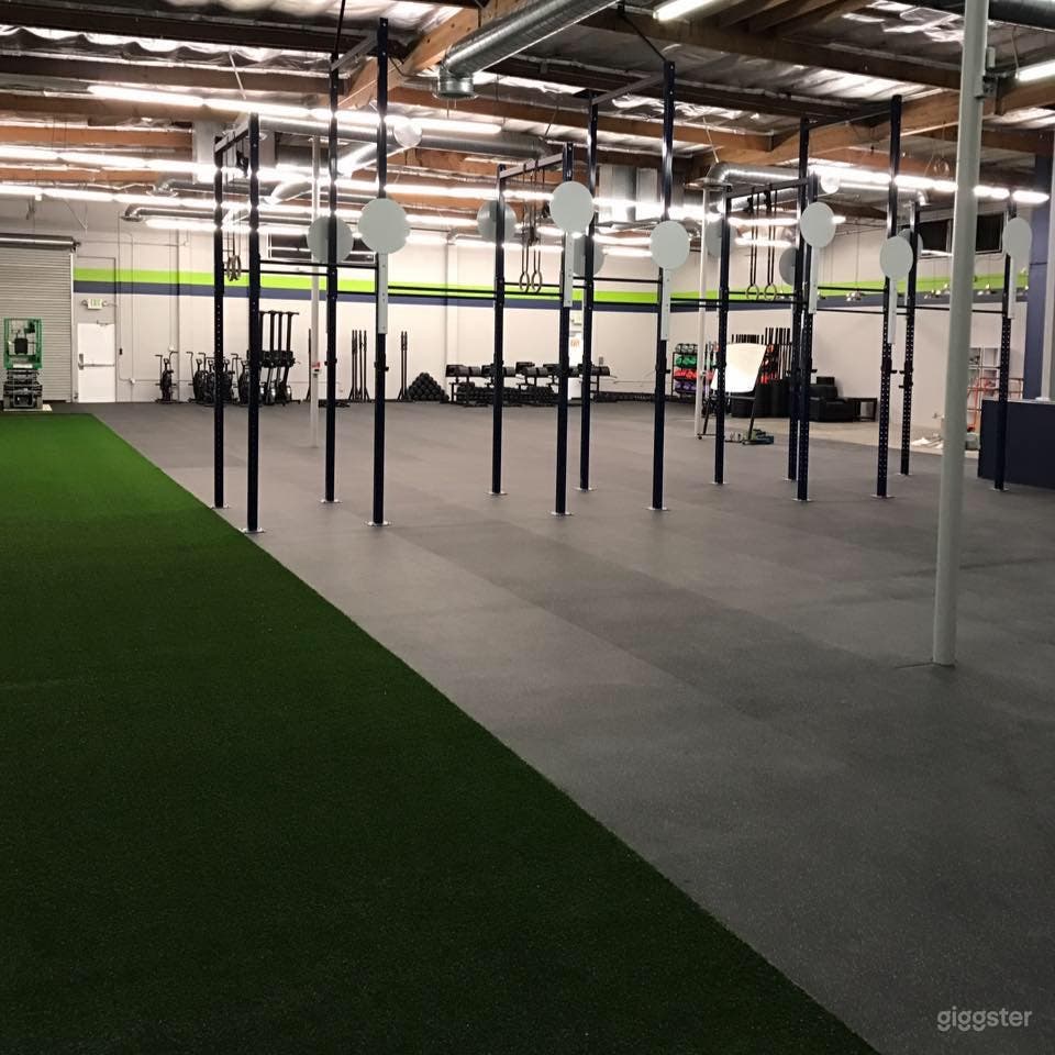 Overall gym spot from the north side of the gym facing parking lot and roll up door 