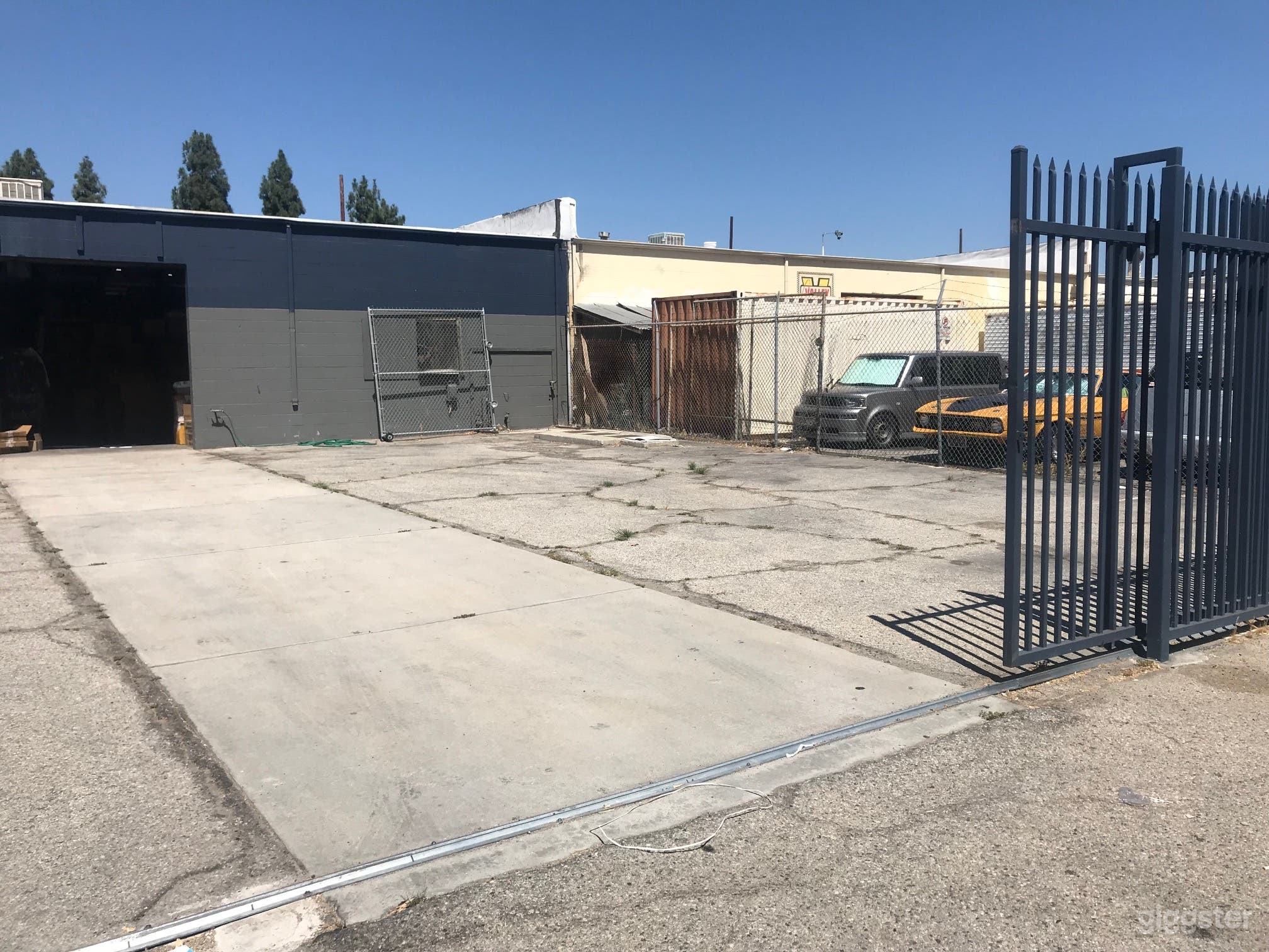 Back Ally Parking Crew Gated Car Garage Warehouse Photo 2