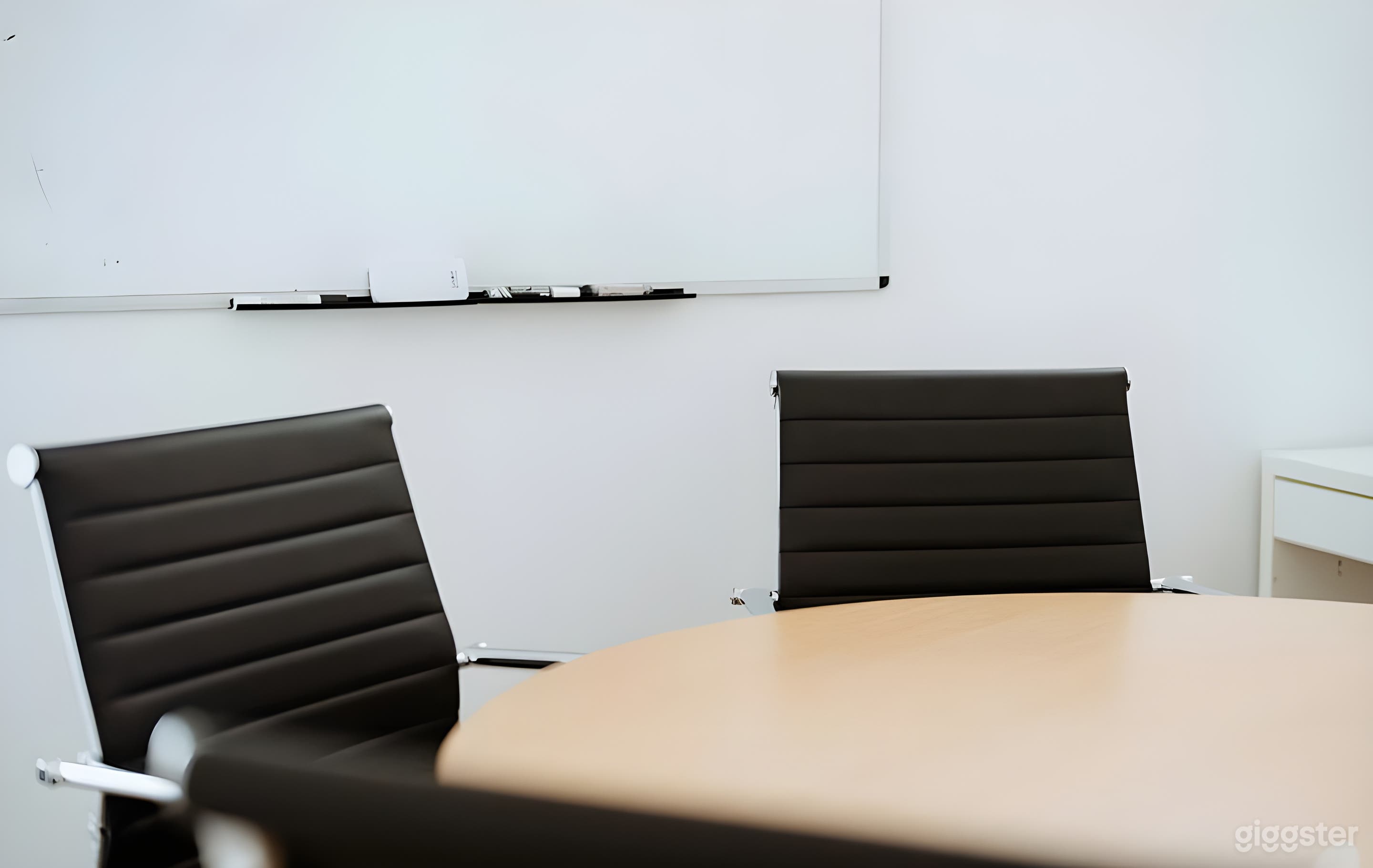 Cozy Conference Room with Whiteboard and Projector Photo 4