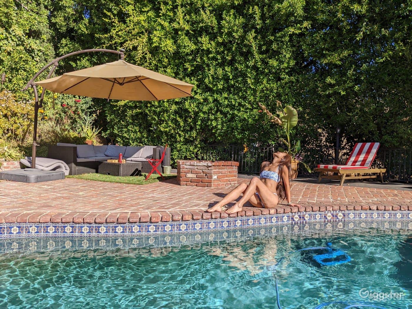 Charming Mediterranean Pool - tiles &amp; brick floor Photo 3