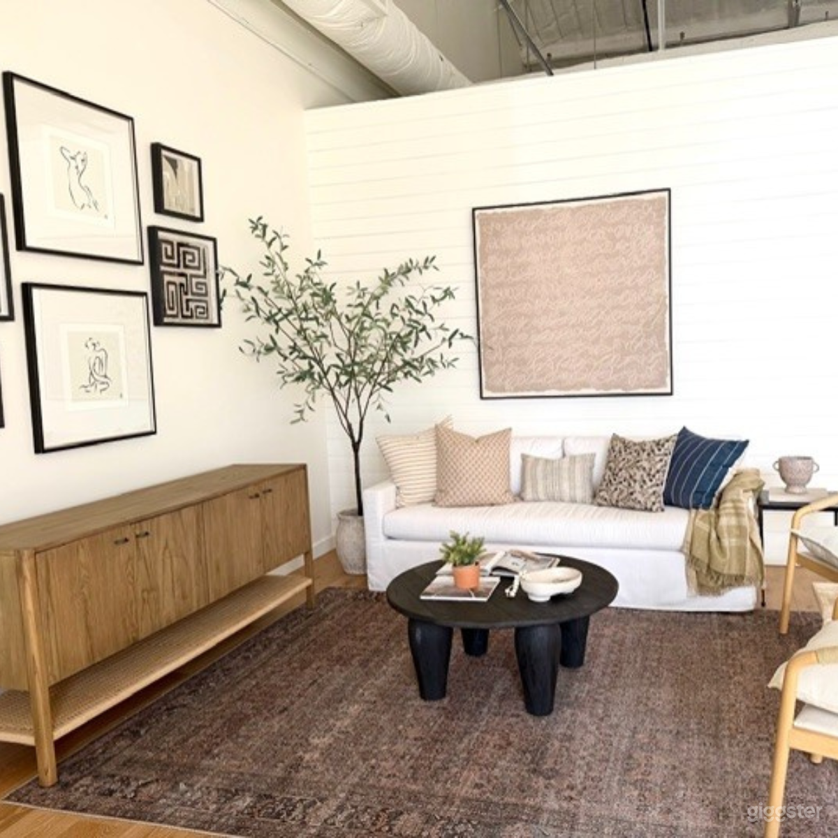 Styled Natural Light Warehouse Studio with Neutral Design Photo 4