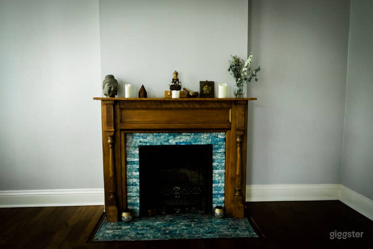  There are two fireplaces that create a warm space and look great with candles lit in them.  