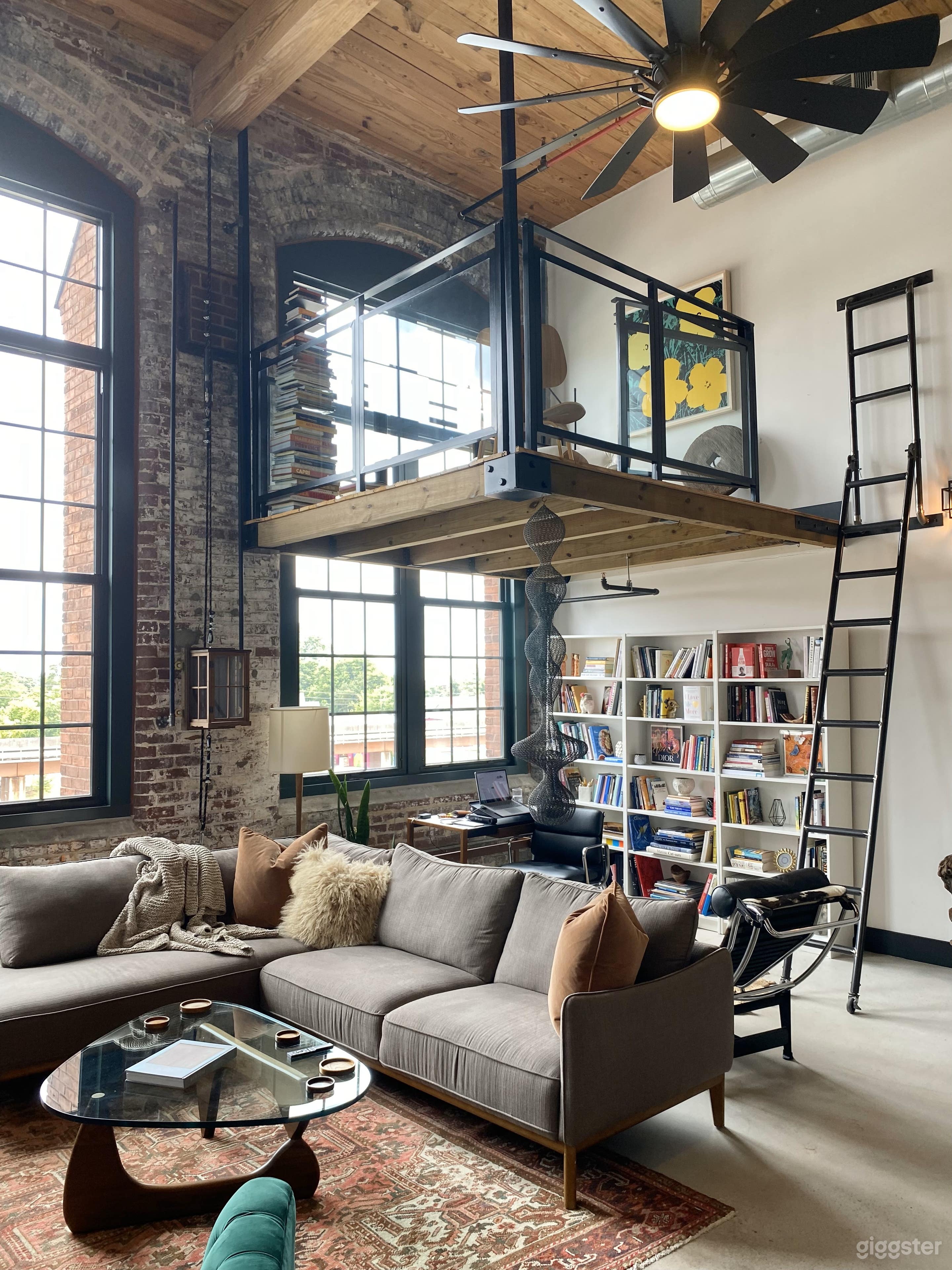 Main living area with office area and 10' x 10" "sky lounge" above