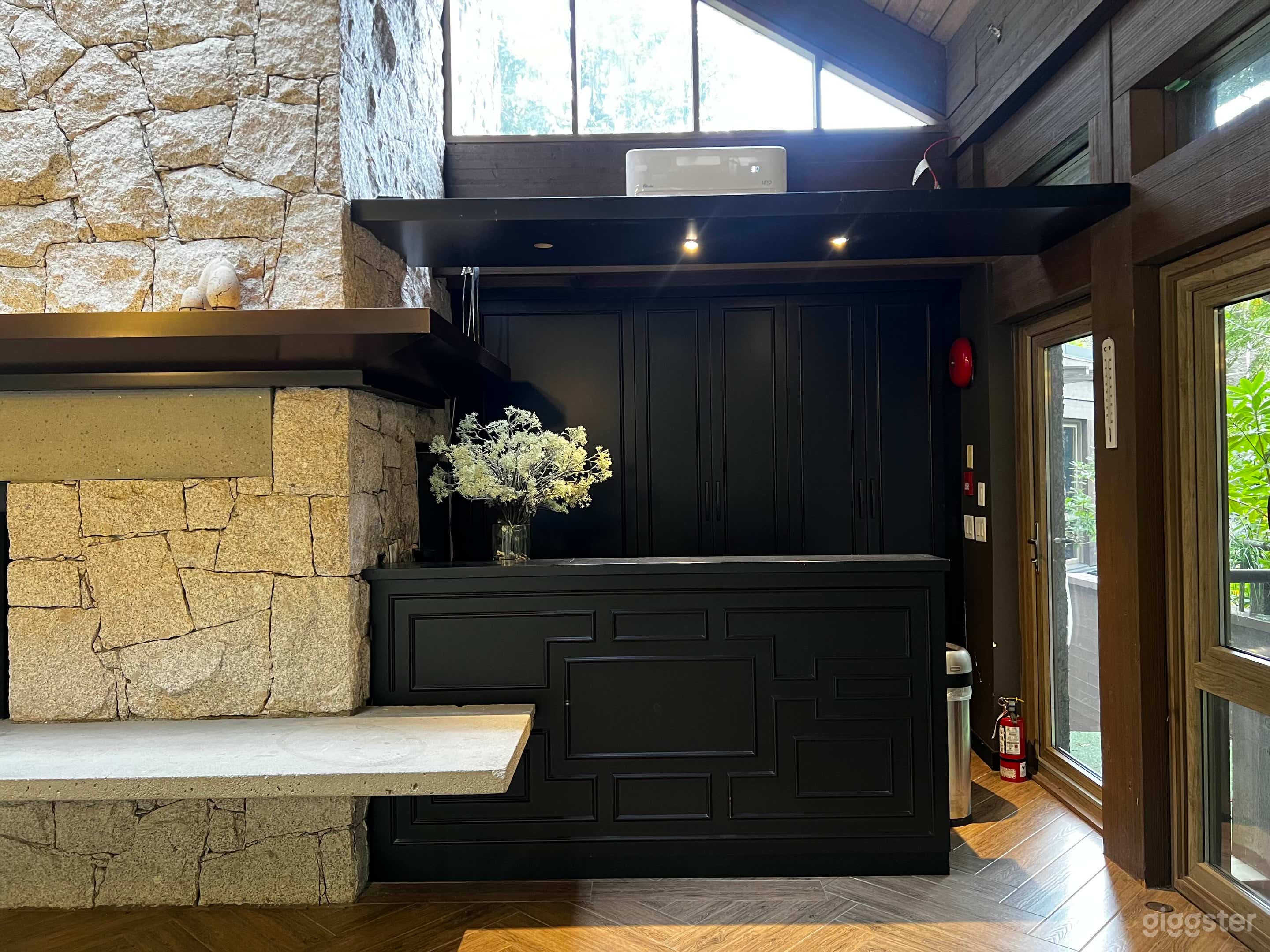 Serene event space with waterfall views Photo 2