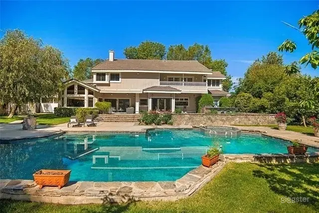 Spacious Backyard Oasis with Pool and Oak Canopy Photo 3