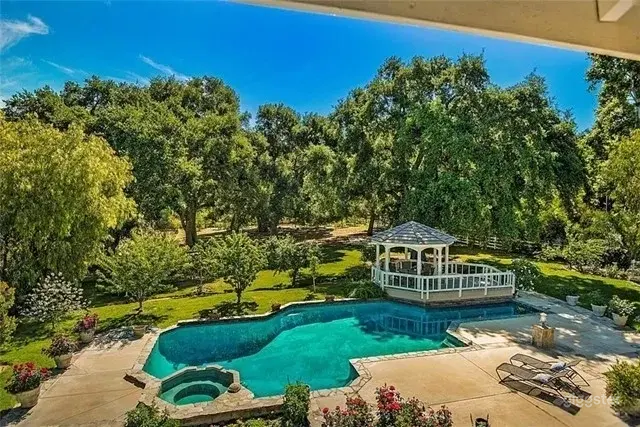 Spacious Backyard Oasis with Pool and Oak Canopy Photo 2