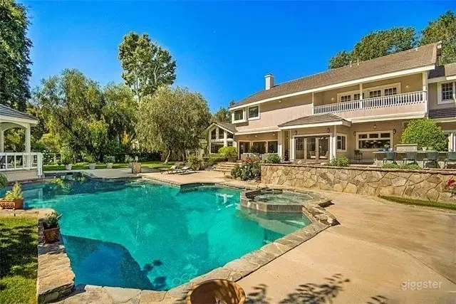 Spacious Backyard Oasis with Pool and Oak Canopy Photo 1