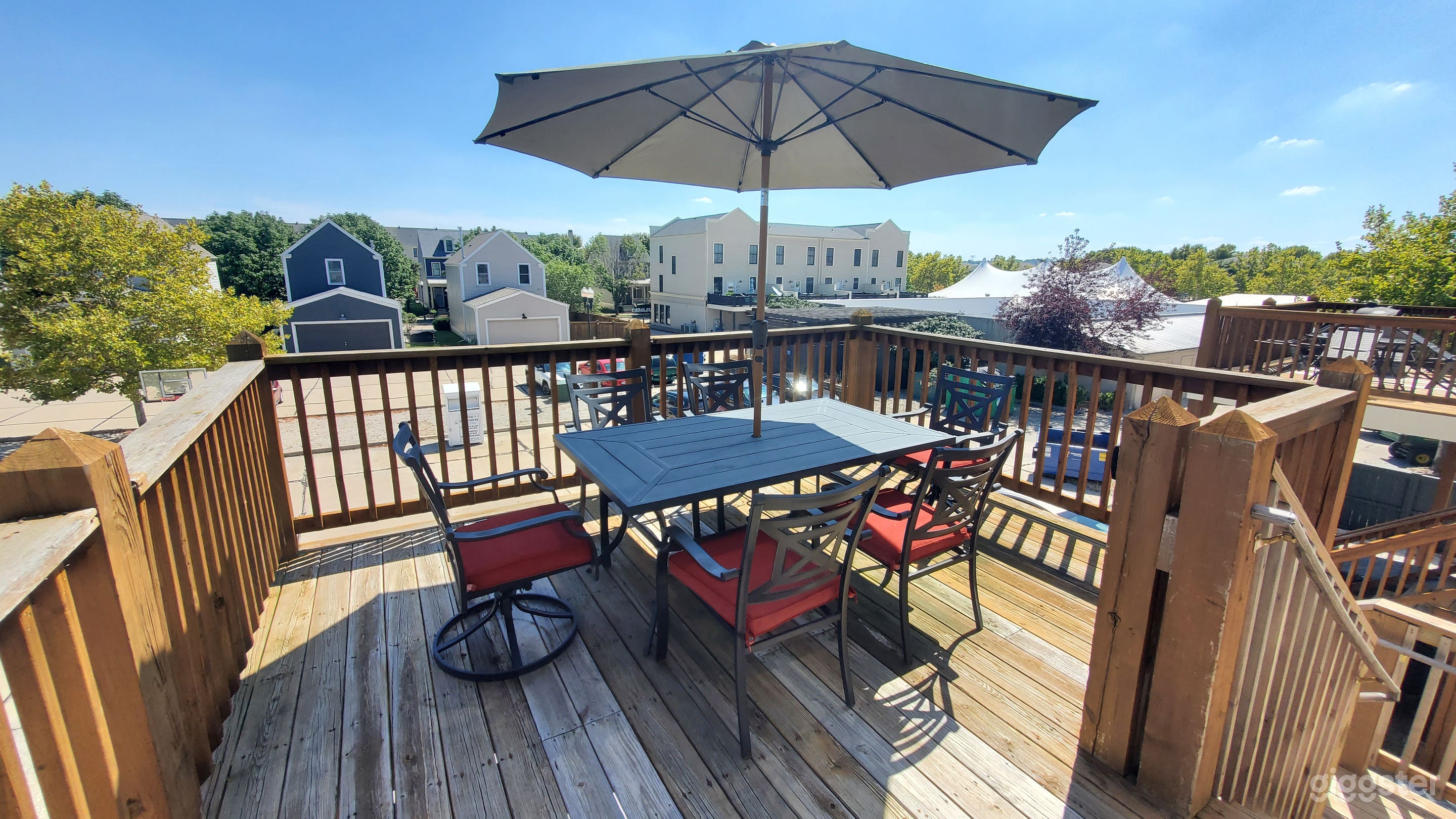 Outdoor seating on the upstairs deck and access to back parking lot 