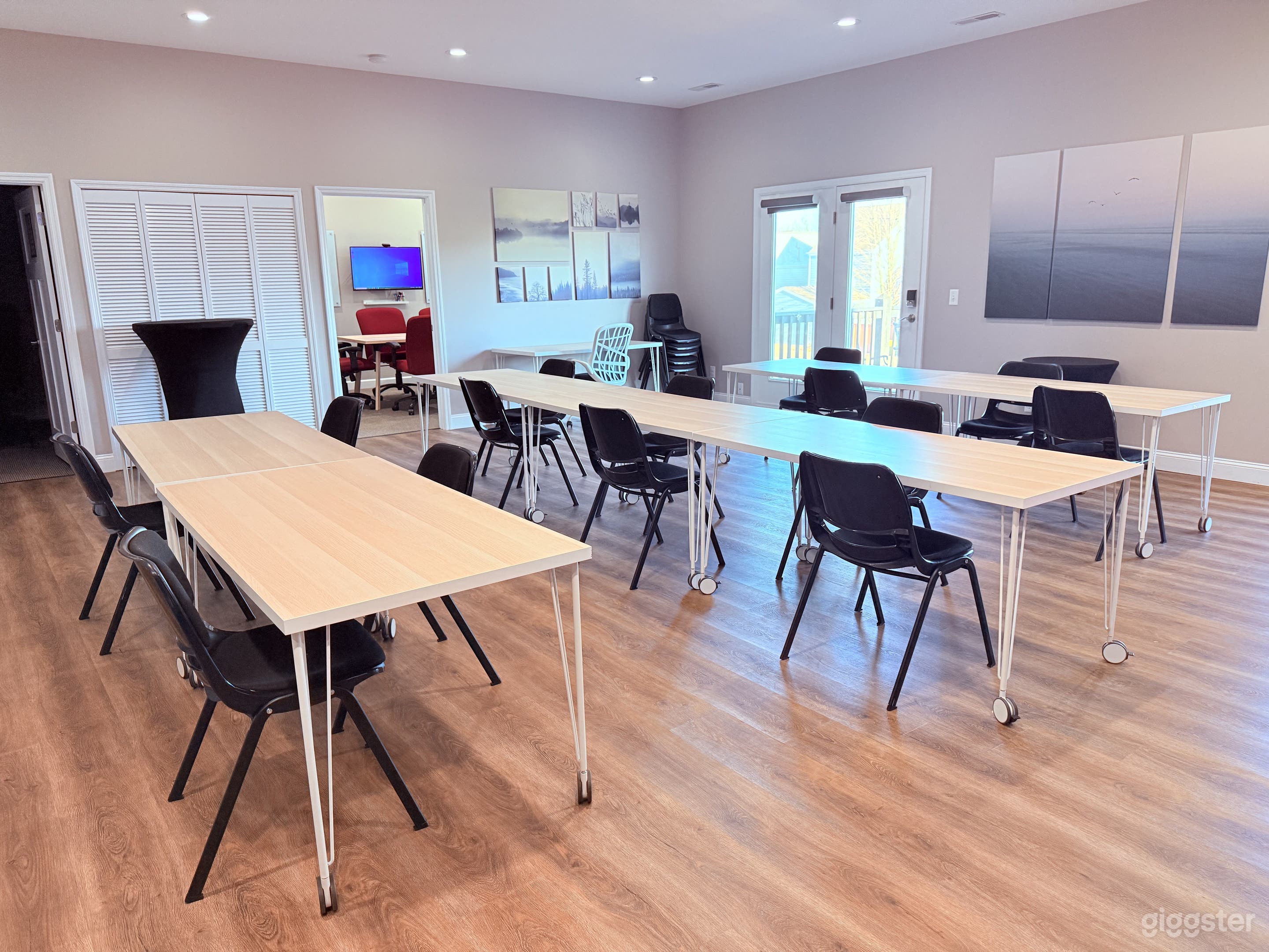 All the tables are on wheels and can be arranged for your specific event.  The doorway out to the deck offers outside seating 