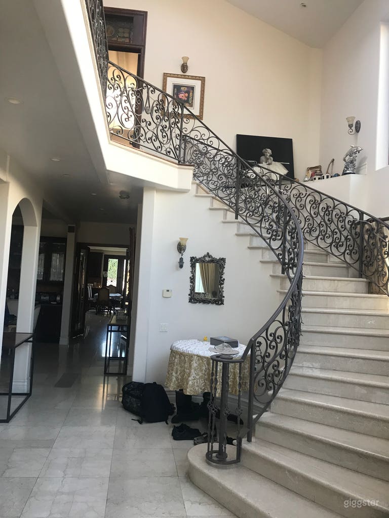  Front of house including staircase 