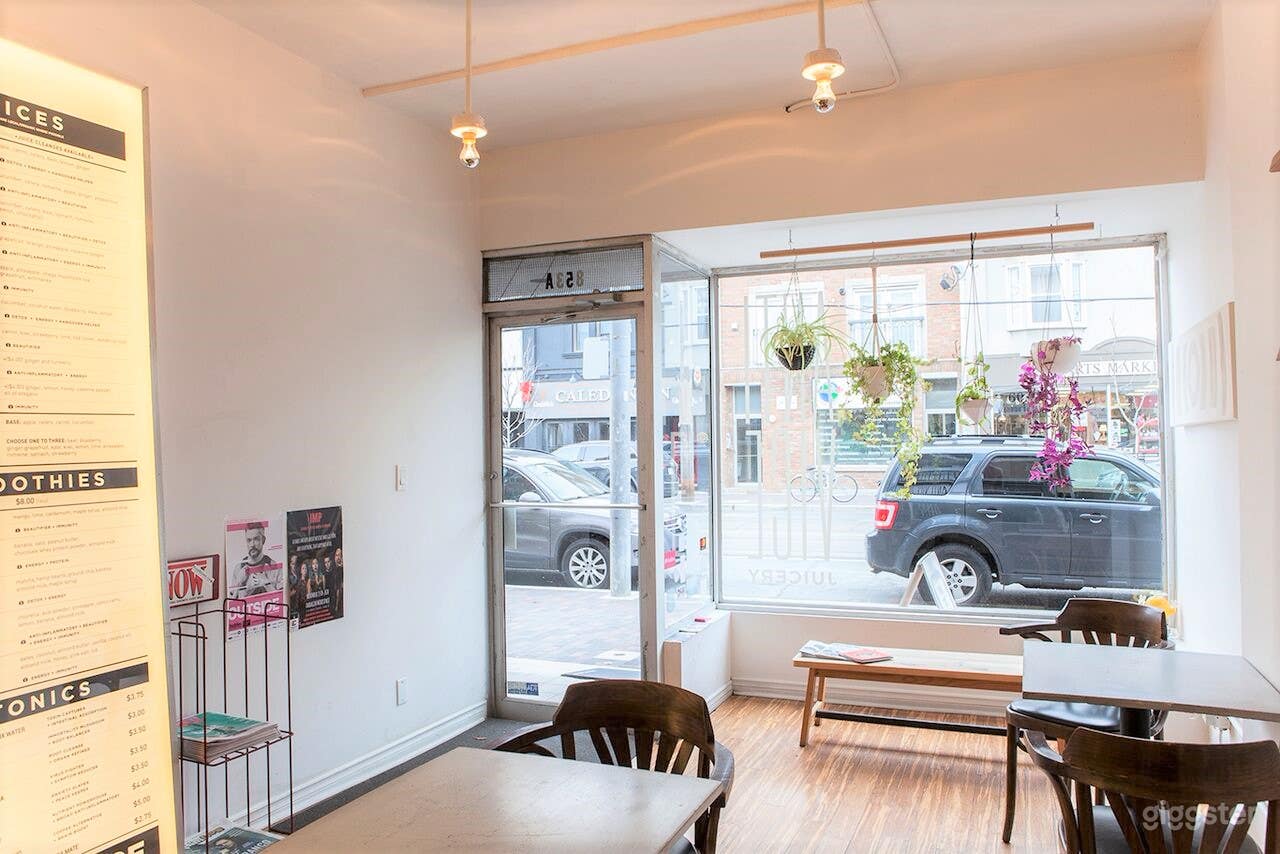 Bright And Well Designed Store Front Photo 2