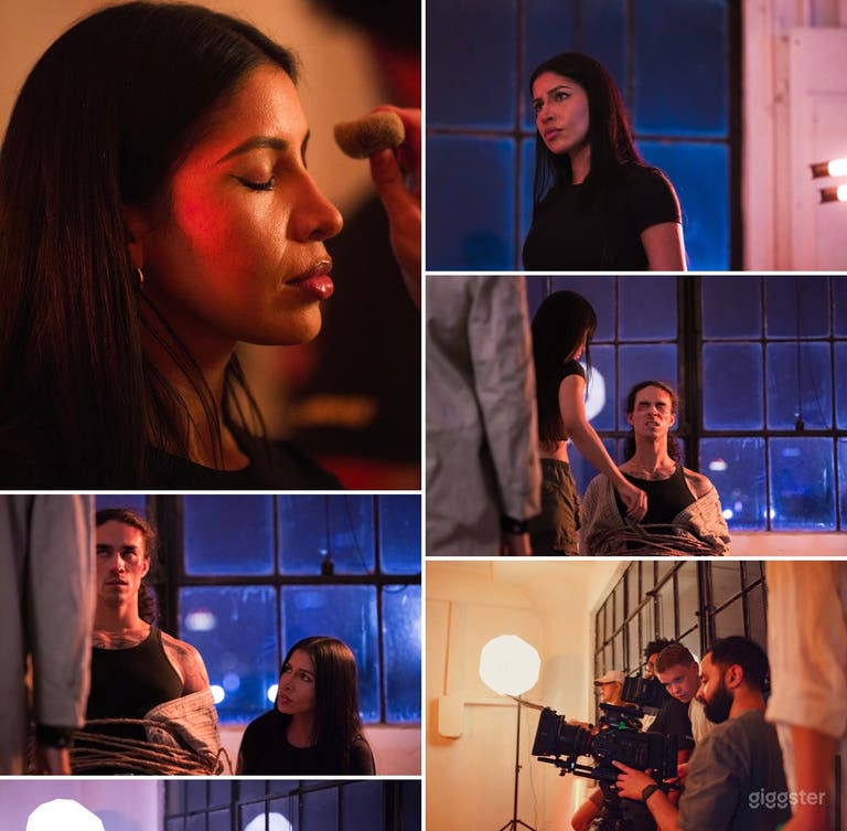  Actors shooting a film in the studio with beautiful city in the back drop 