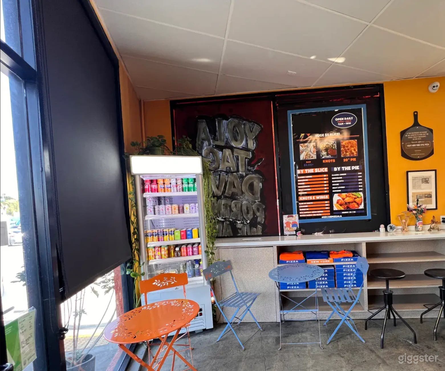 Vibrant, Youthful Pizzeria with Strong Visual Identity Photo 1