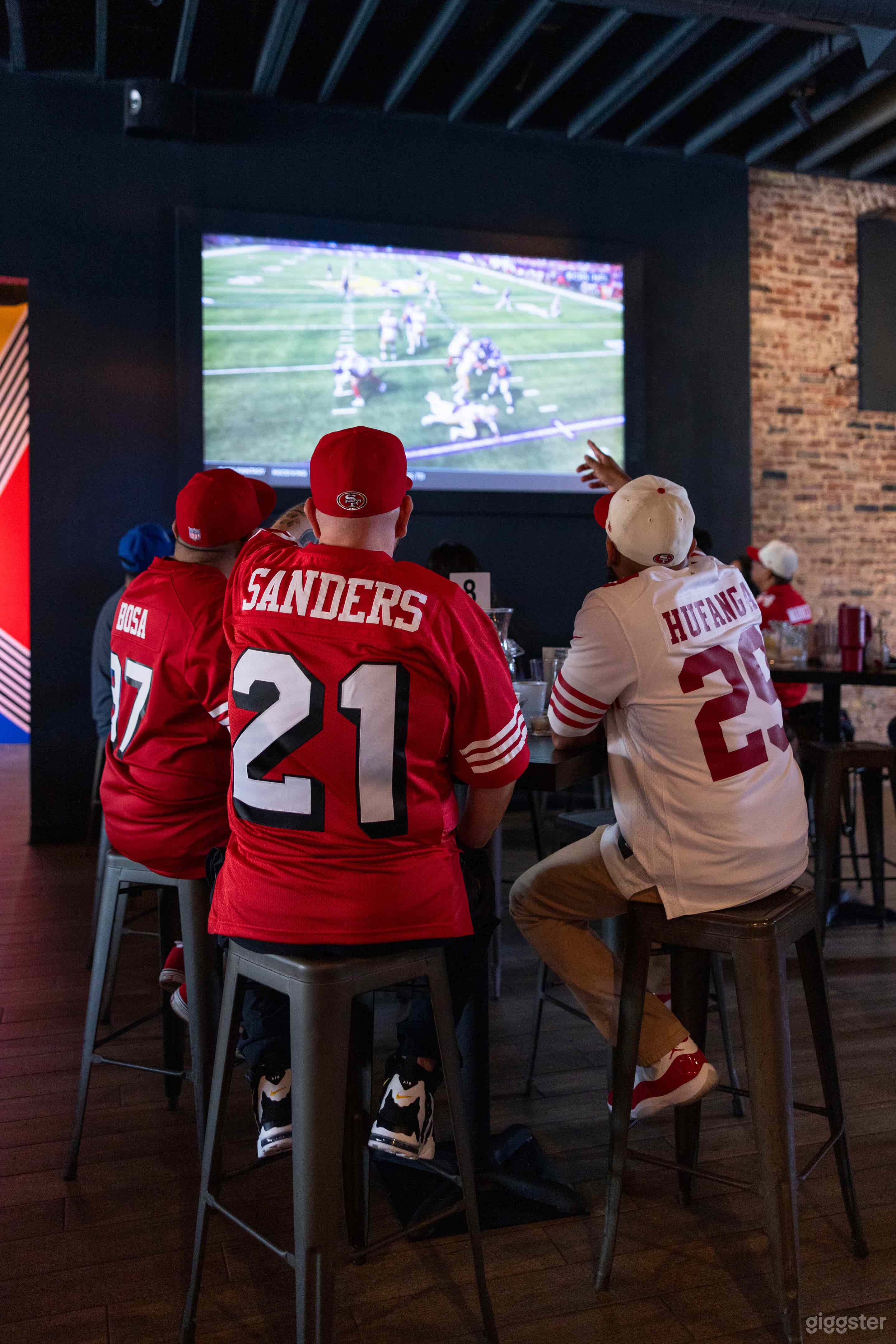 Two-120" Projectors and Nine-65" TVs.