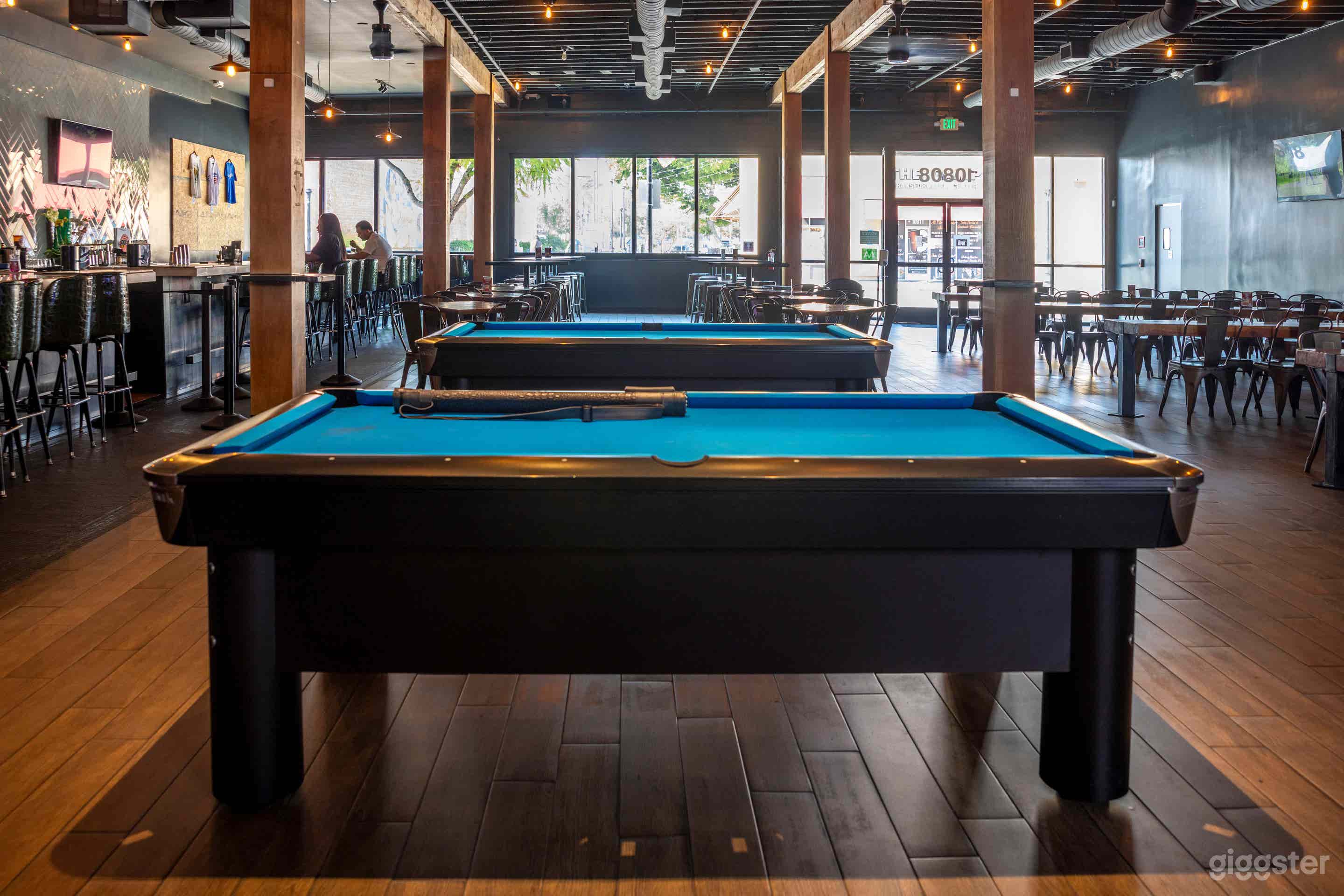 Two Brunswick Billiards Tables.