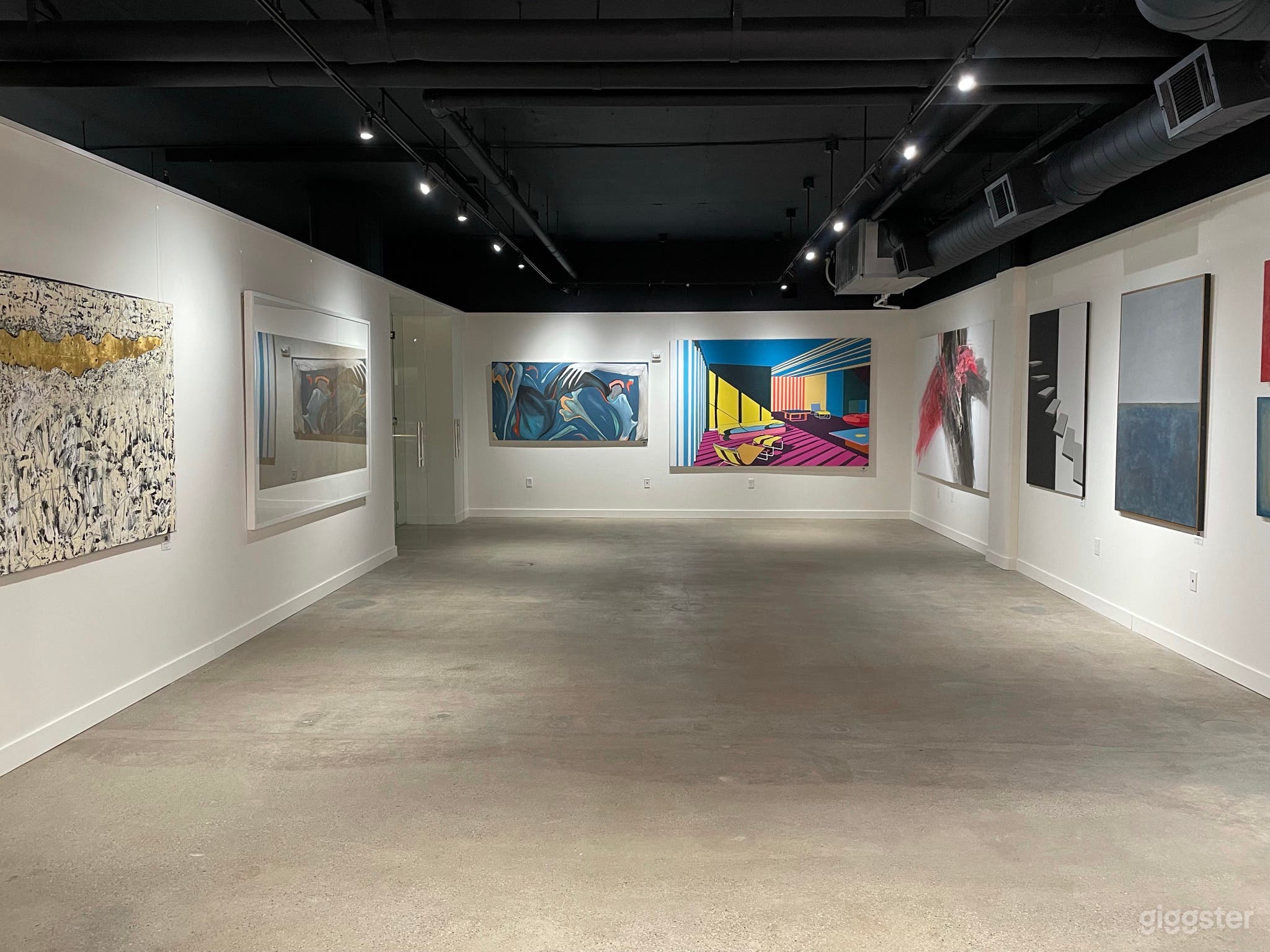 View of the main gallery space from the vantage point of the board room