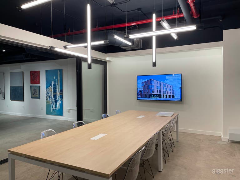  Multi-purpose boardroom space. Not pictured is the expansive Brooklyn view that would be visible to the right of the picture frame.  