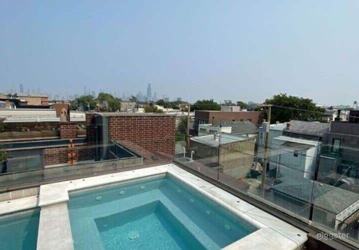 Spacious Rooftop Deck with Pool and City Views Photo 2