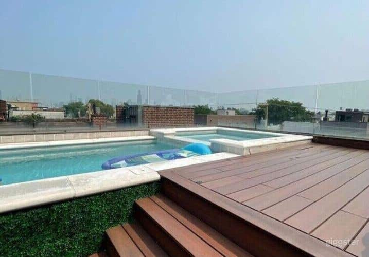Spacious Rooftop Deck with Pool and City Views Photo 3